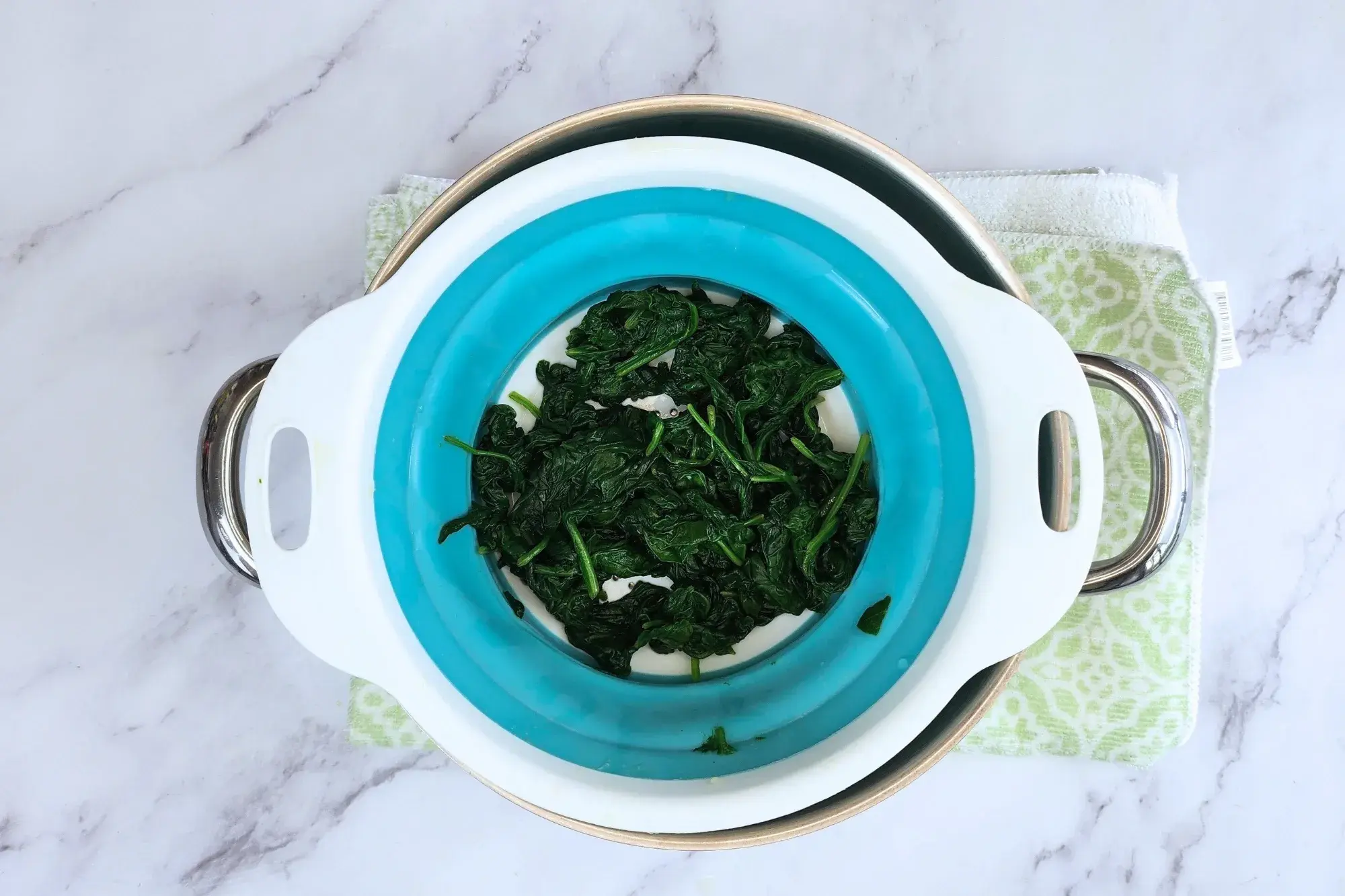 A basket with boiled spinach
