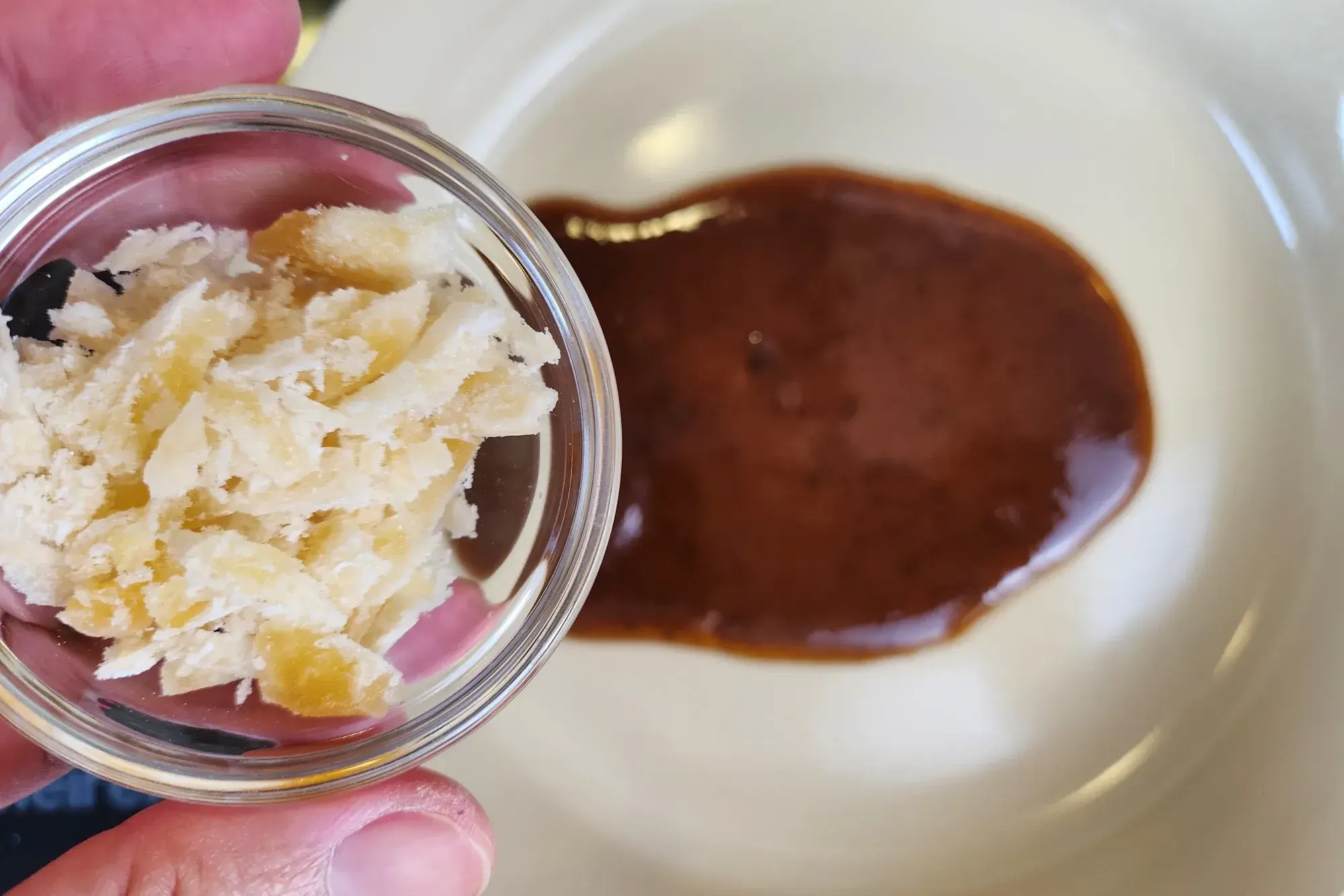 A hand mashed lemon grass