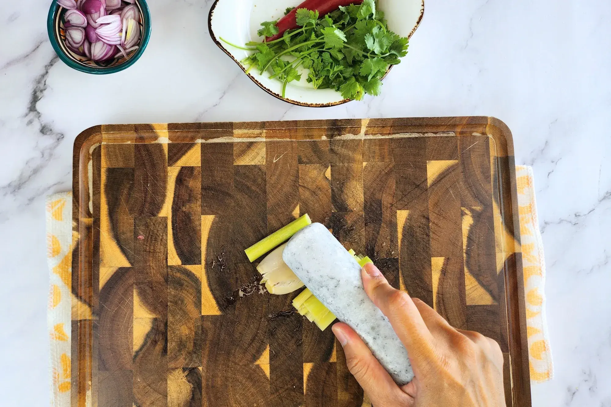 A hand mashed lemon grass