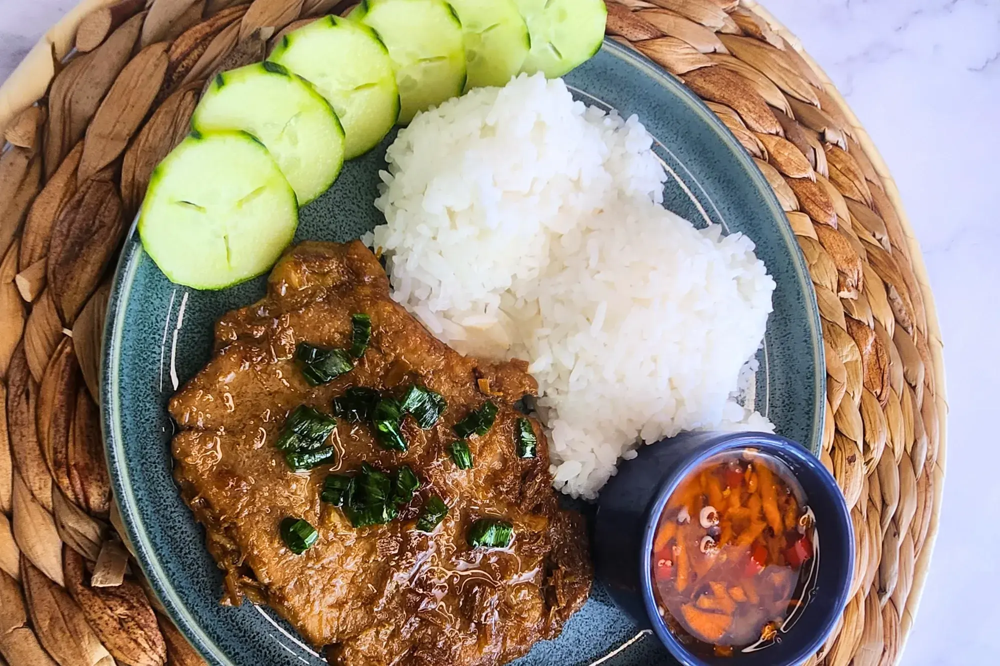 A plate of rice and Lemongrass Pork Chops