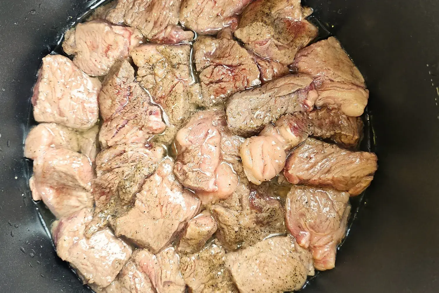 A pot of cooking meat