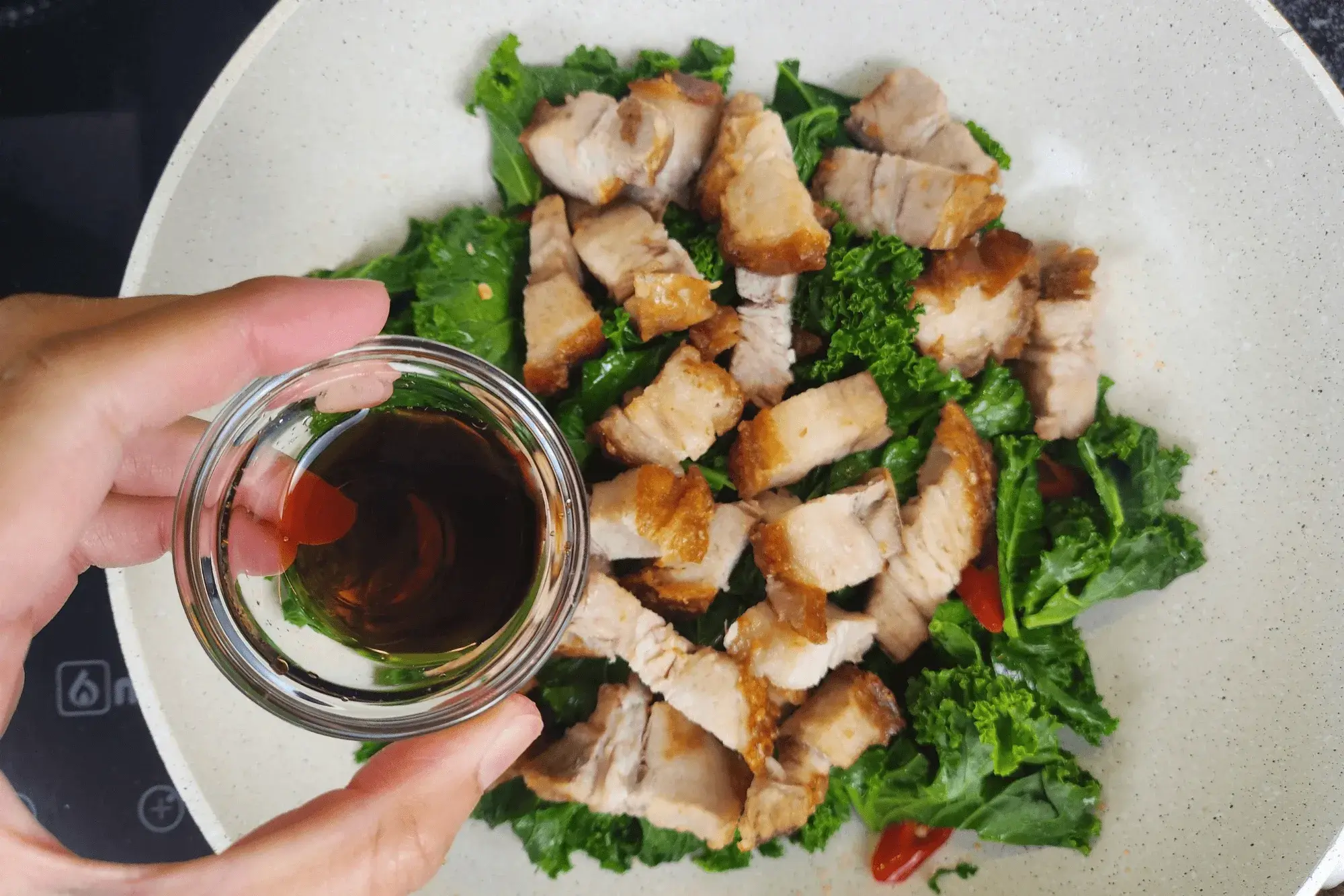 Add light soy sauce - Crispy Pork Belly with Kale