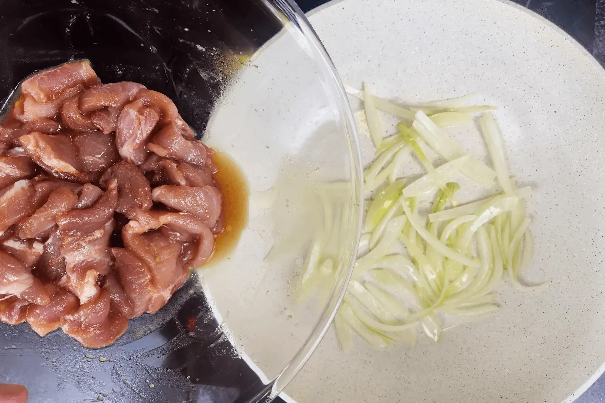 Add the marinated pork and cook until fully cooked and lightly caramelized.