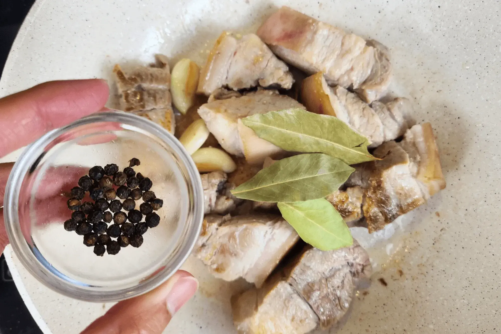 black peppercorns and pork Adobo