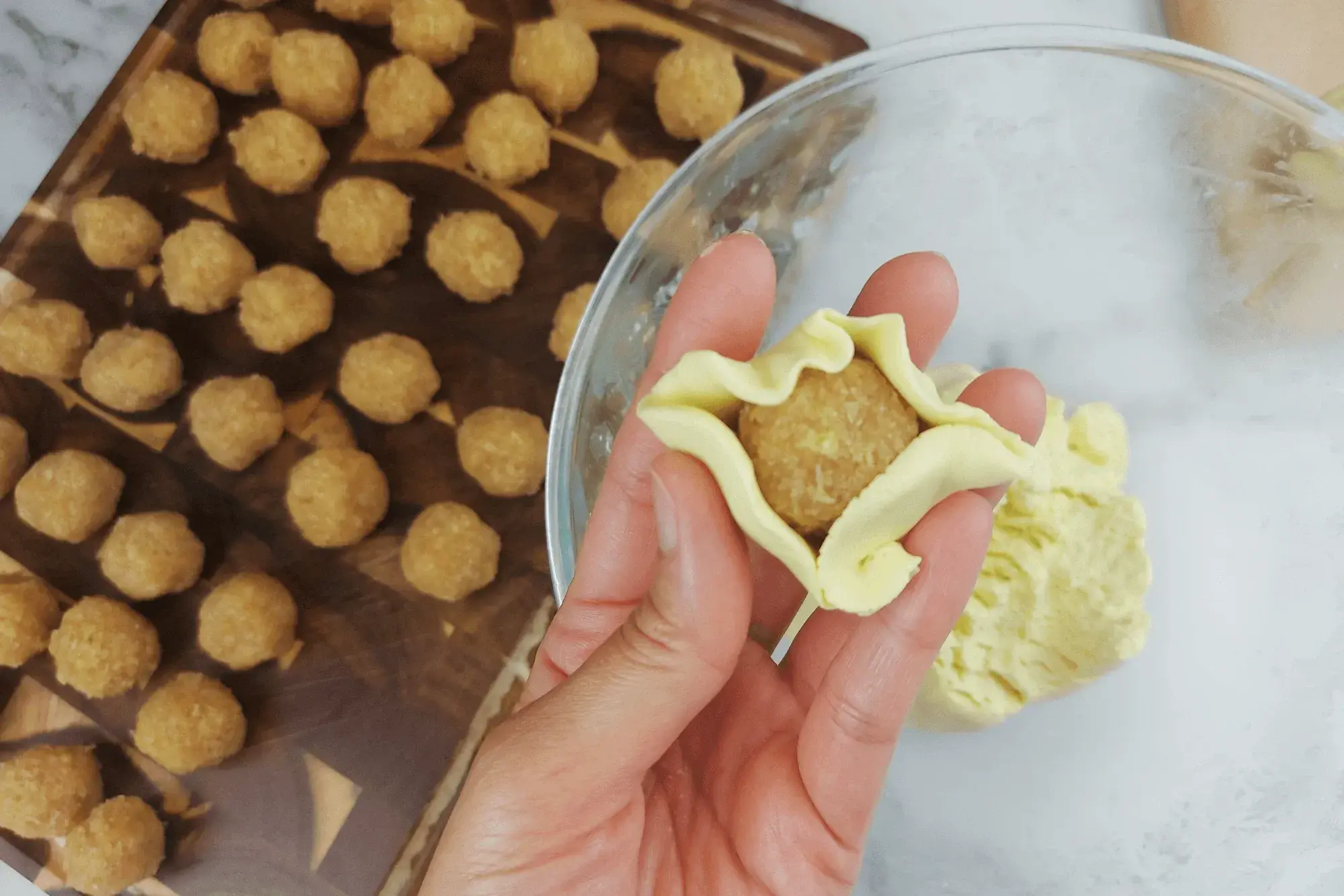 Carefully seal and roll it into a smooth ball.