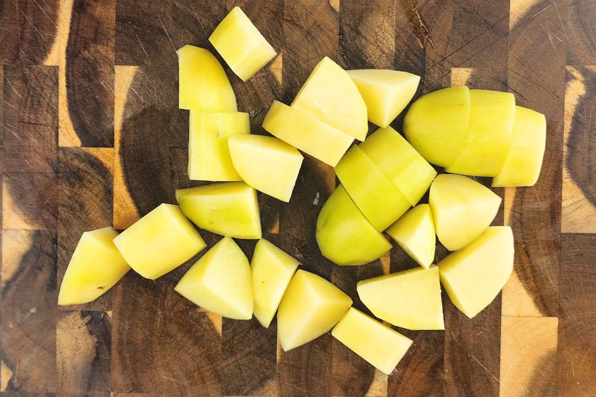 Chop potatoes into bite size.
