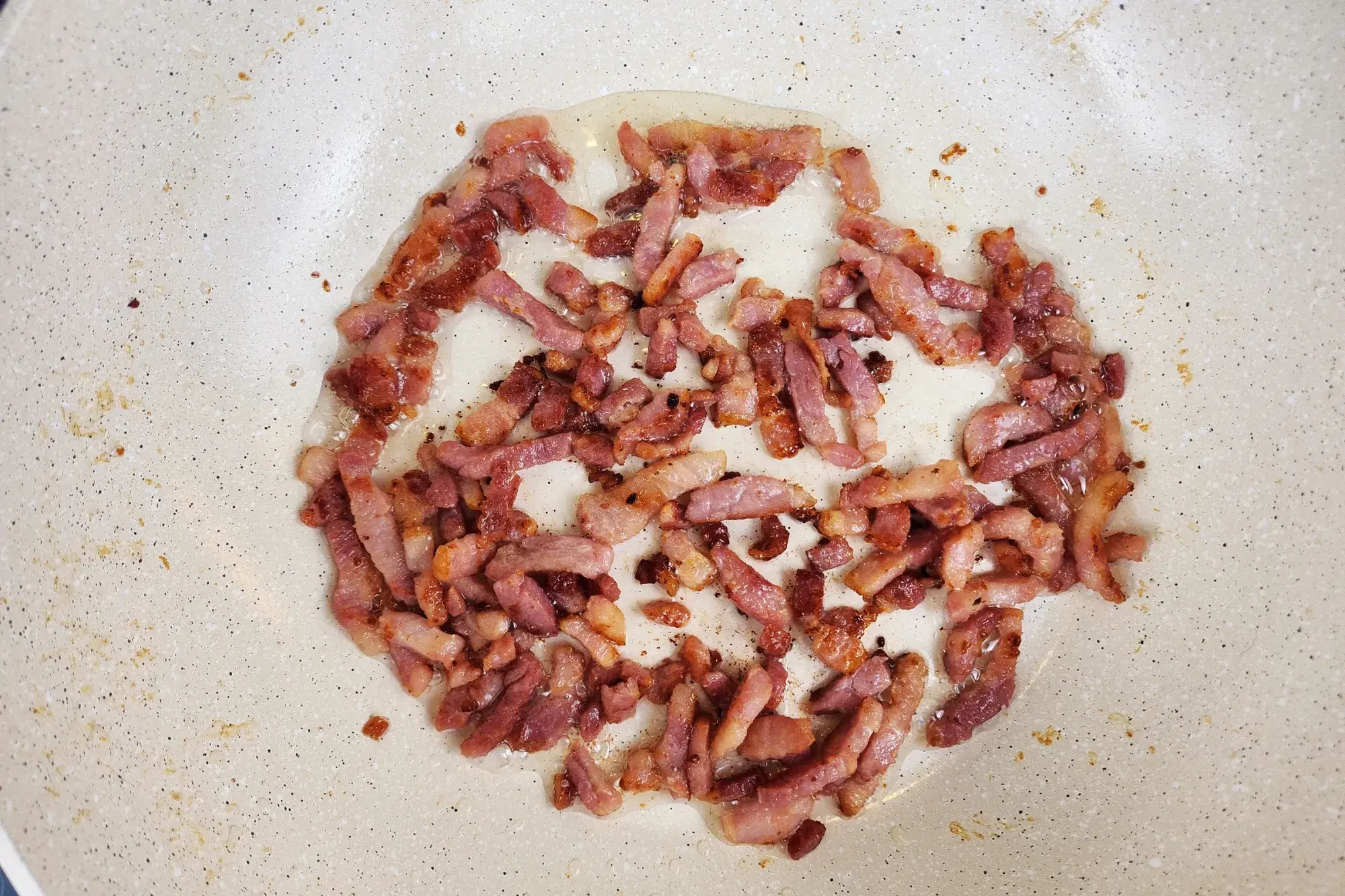cook the diced bacon until crispy