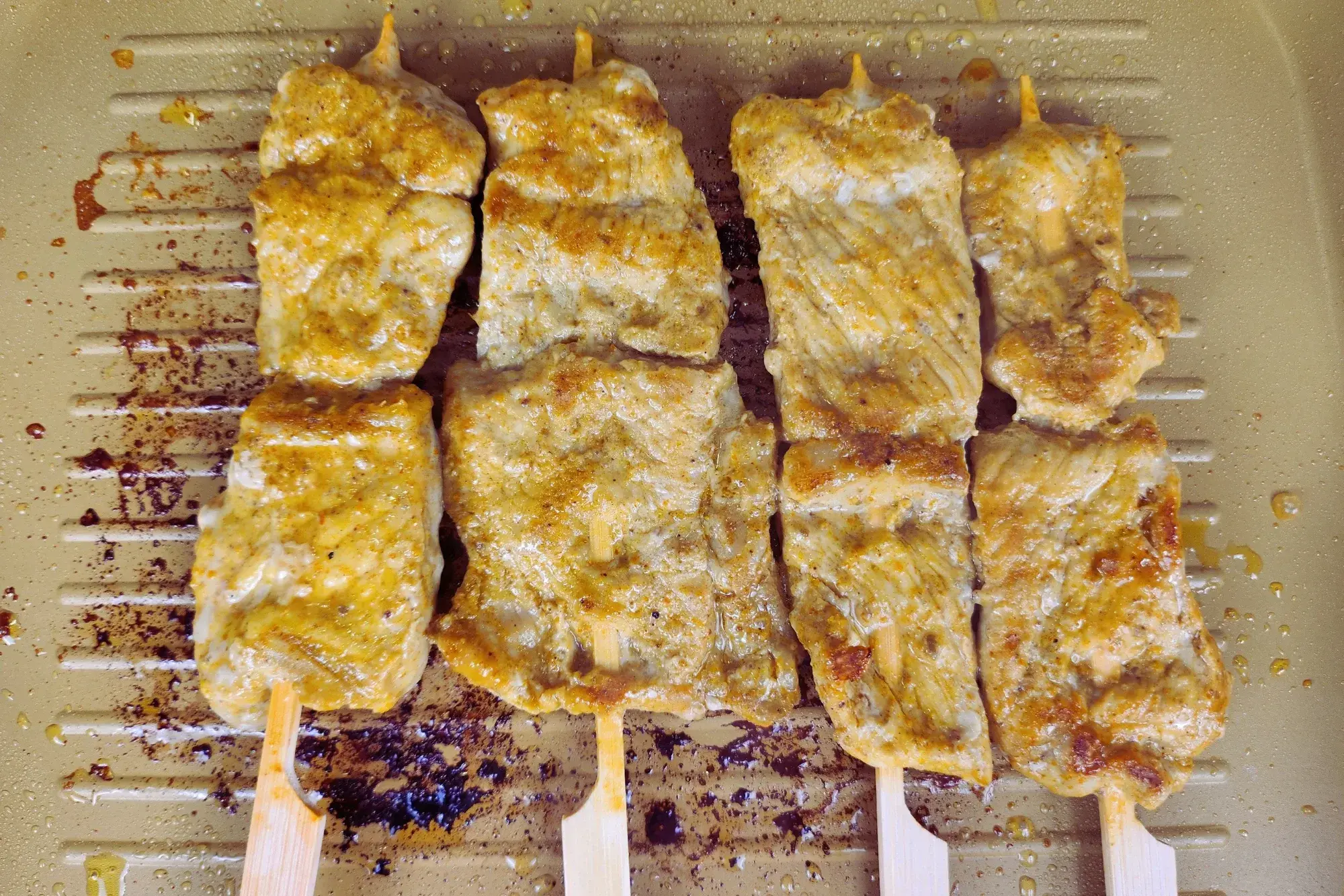 Cooked grilling pork on a grilling pan