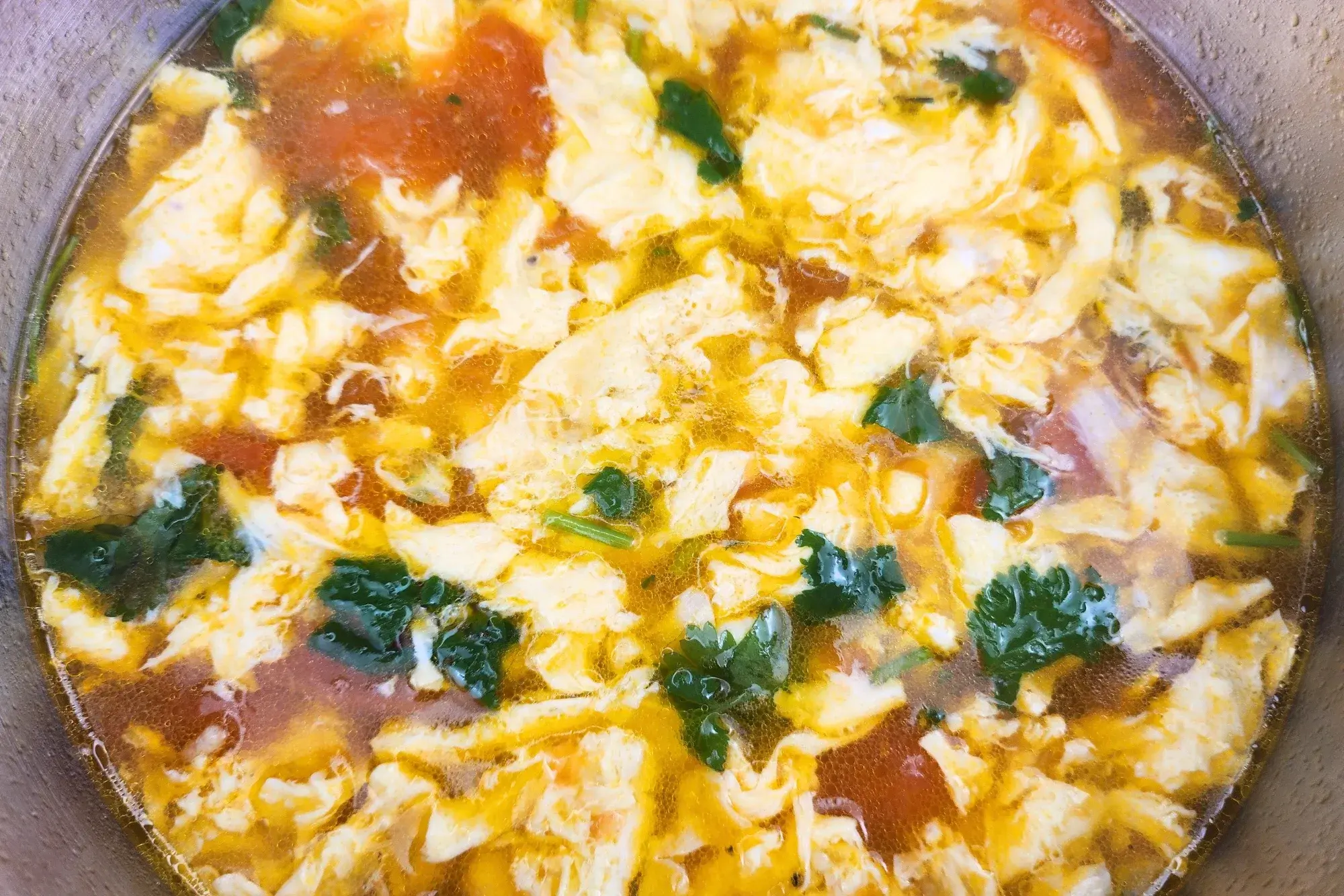 Cooked Tomato Egg Drop Soup.