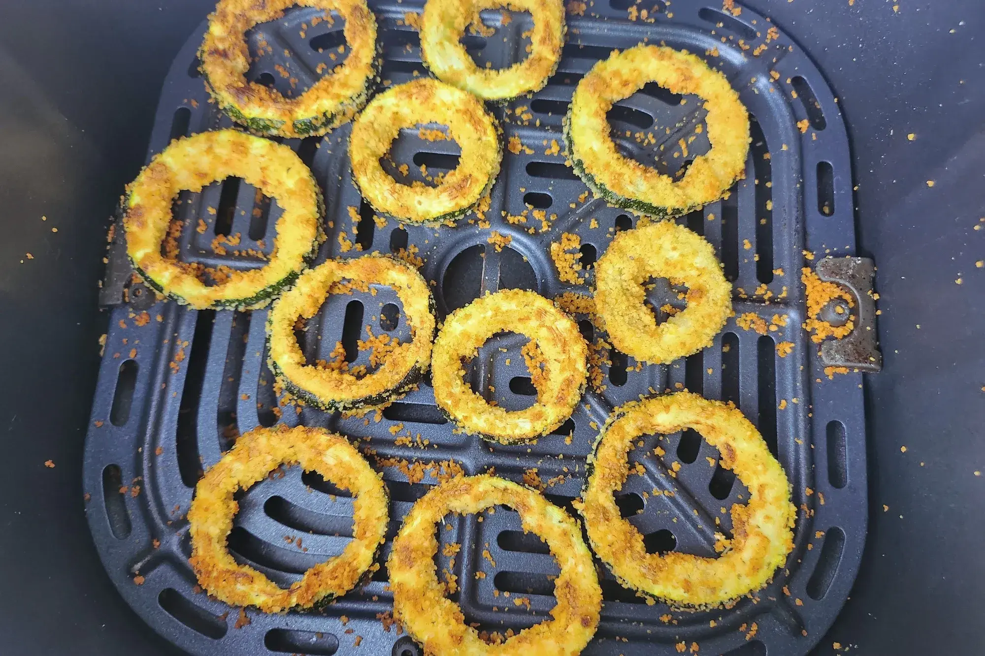 Cooked zucchini rings in basket