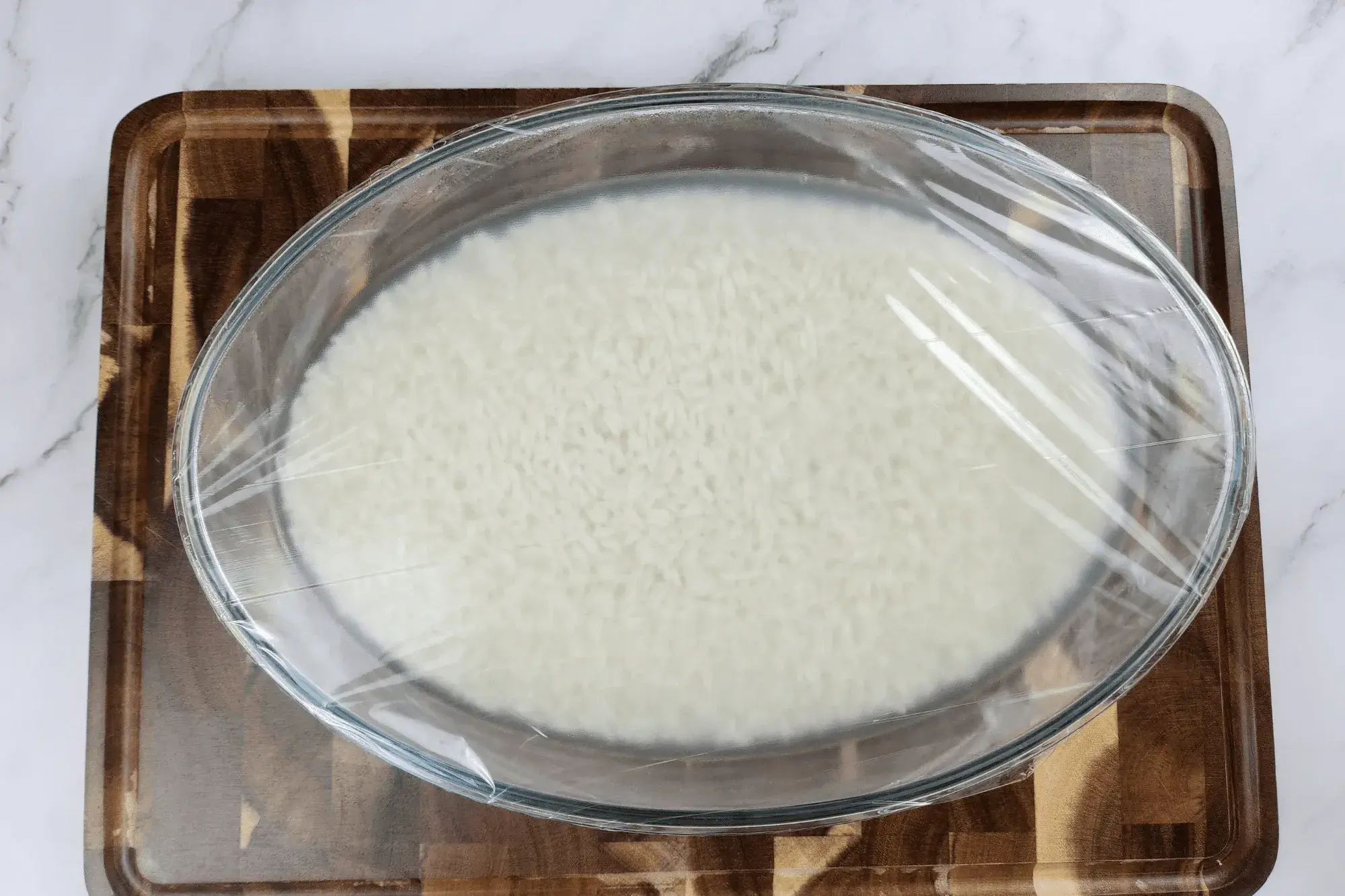 Cover the bowl with cling film.