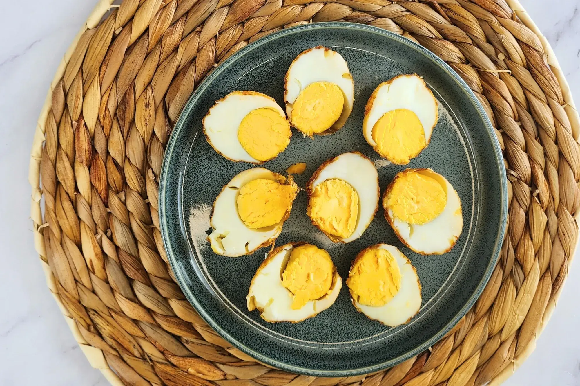Cut eggs on a round plate.