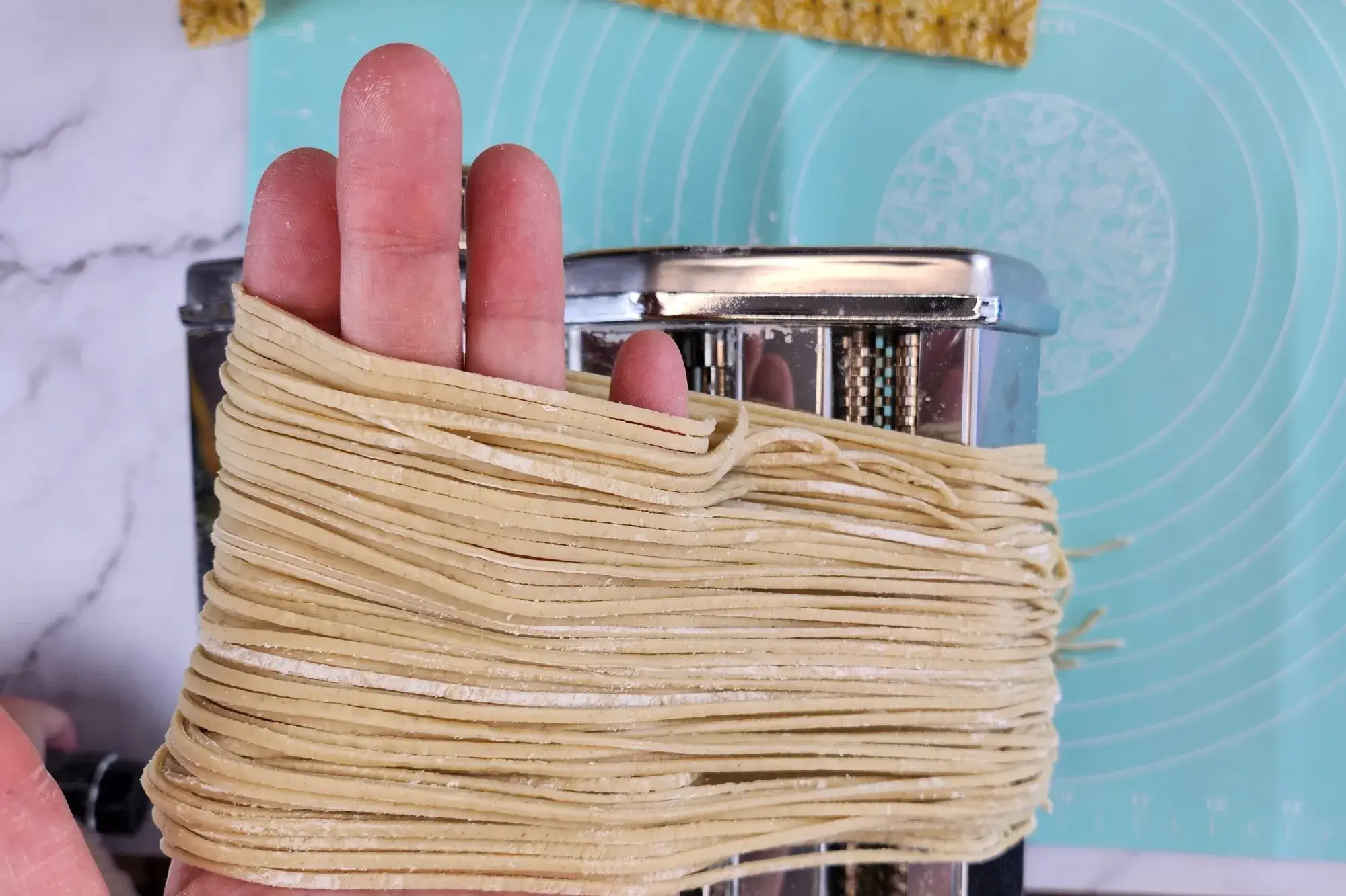 Cut the dough into noodle strands - small size