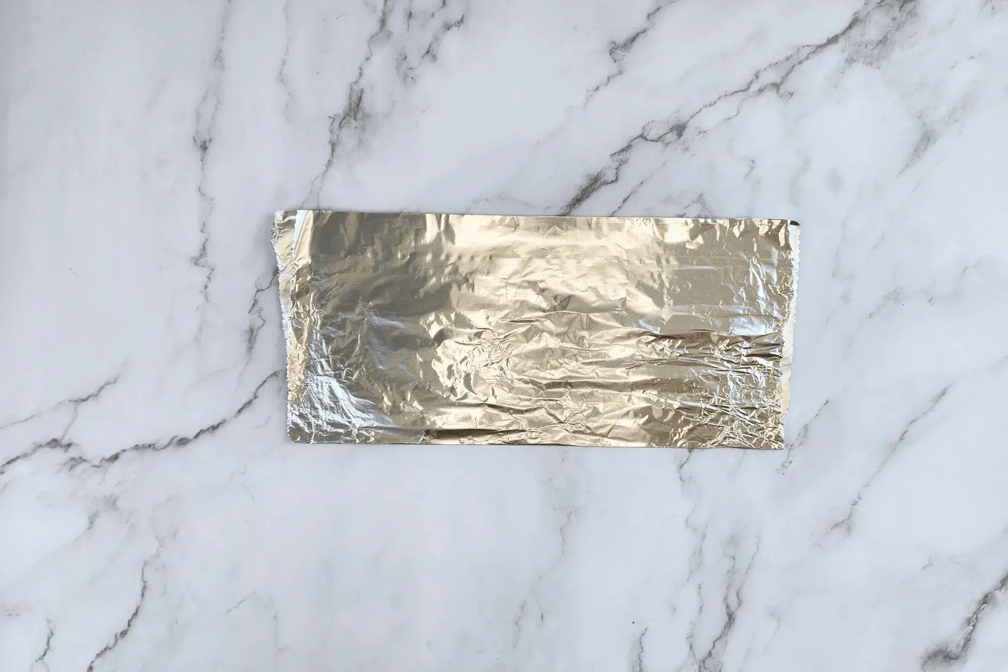 Fold each square in half diagonally