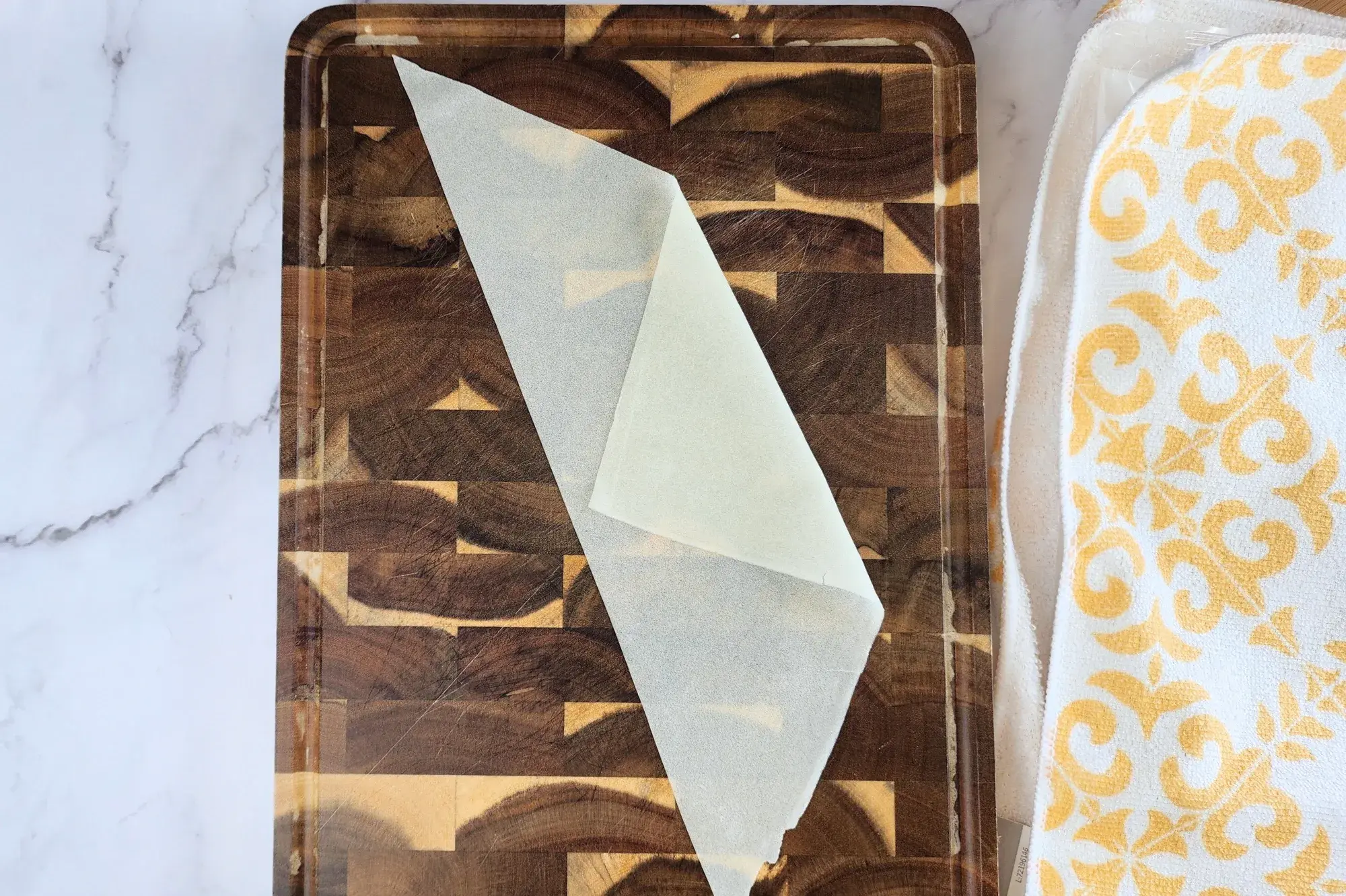 Fold one end into a triangle shape