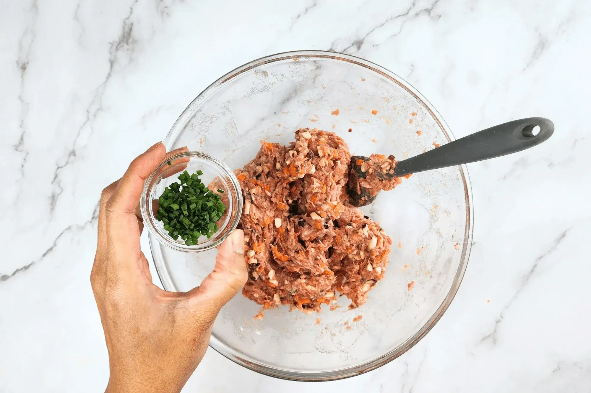chopped green onions with mixing bowl