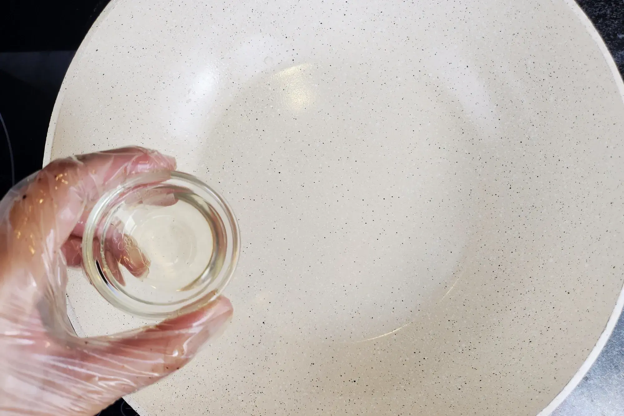 Heat a wok over medium heat until hot and add a bit of oil 