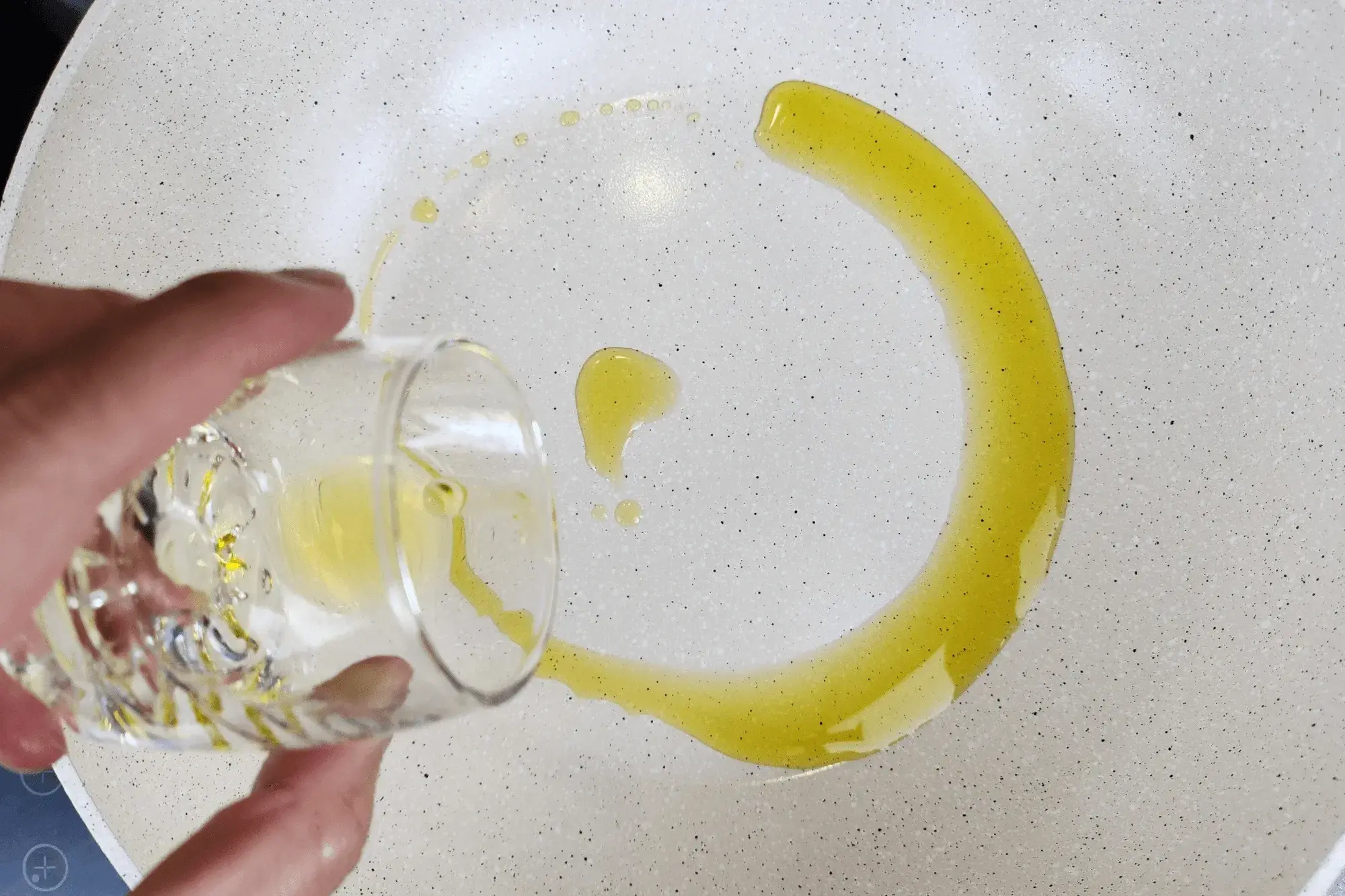 Heat a wok then add oil