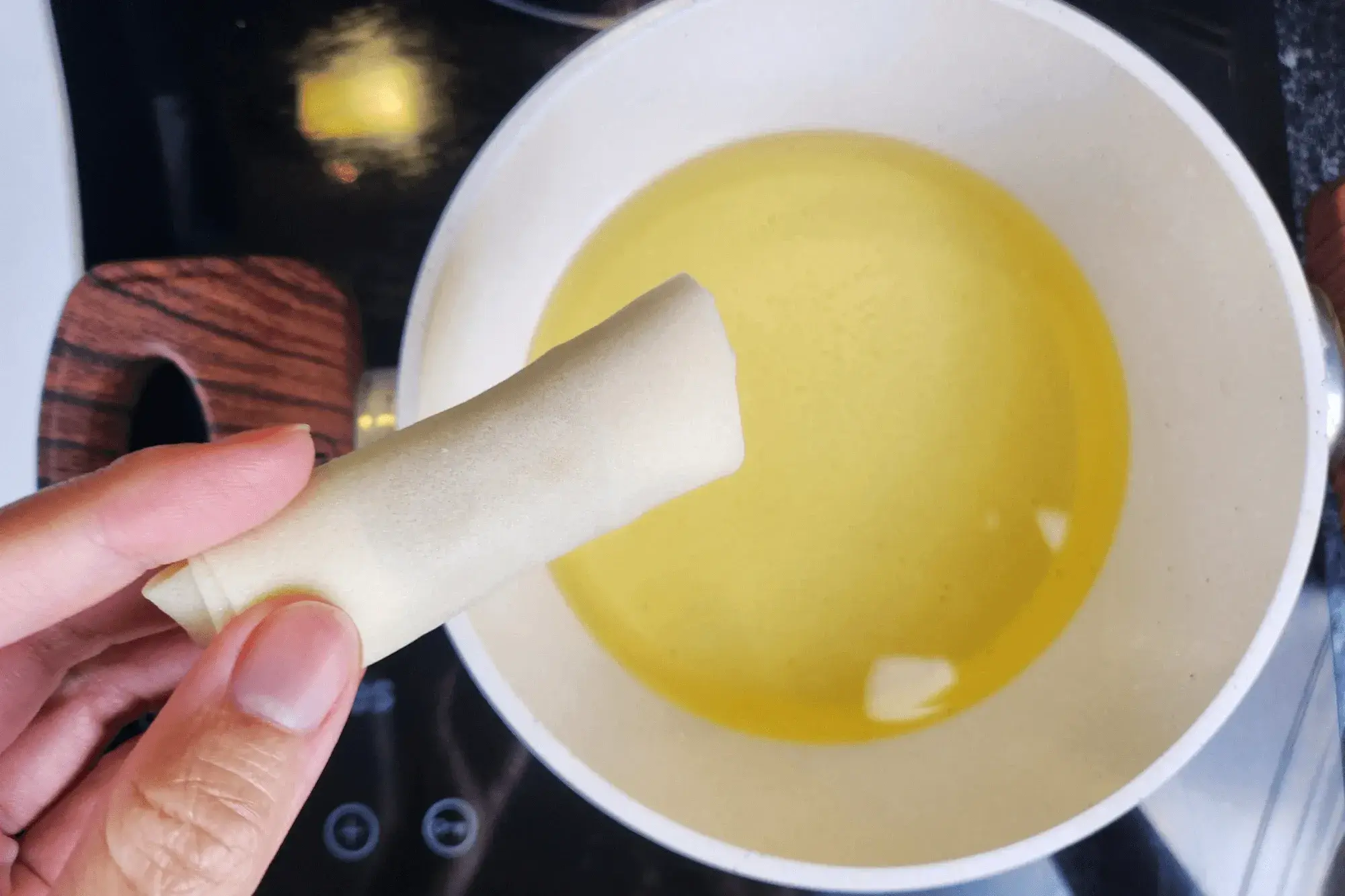 Heat enough oil in a deep pan to 350°F (175°C).