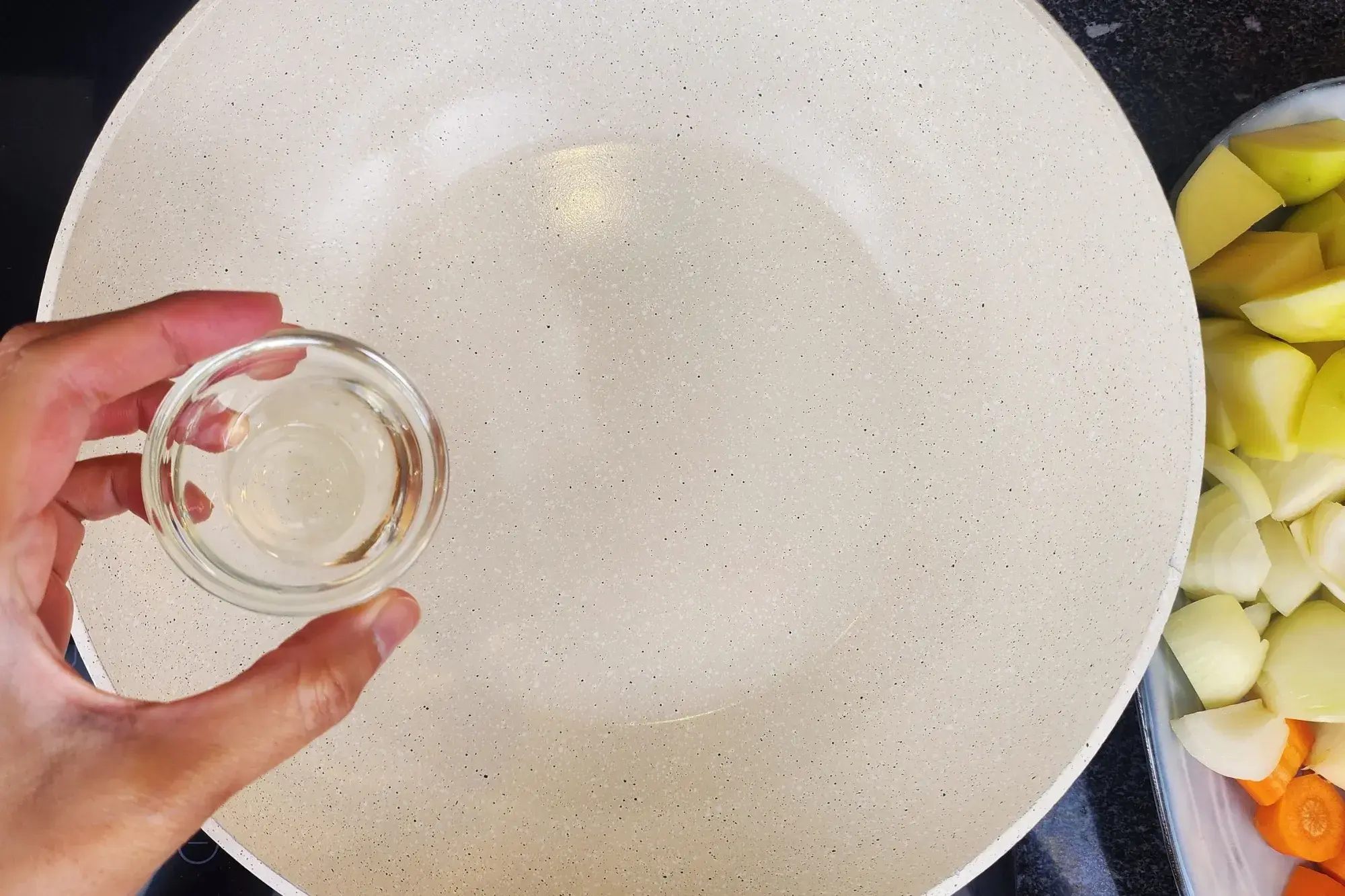 Heat vegetable oil in a large pot over medium heat. 