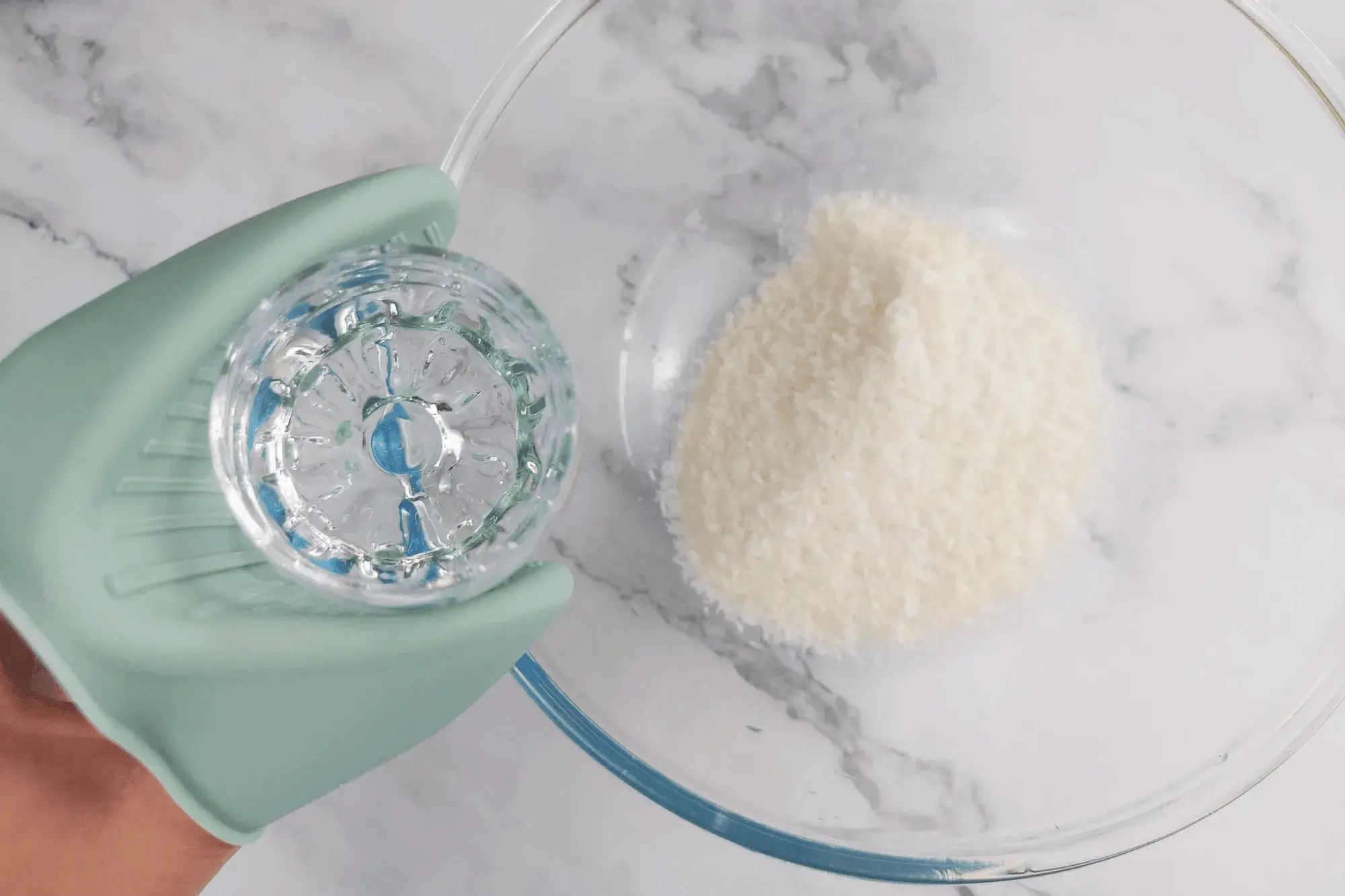 If using desiccated coconut, mix it with hot water. 