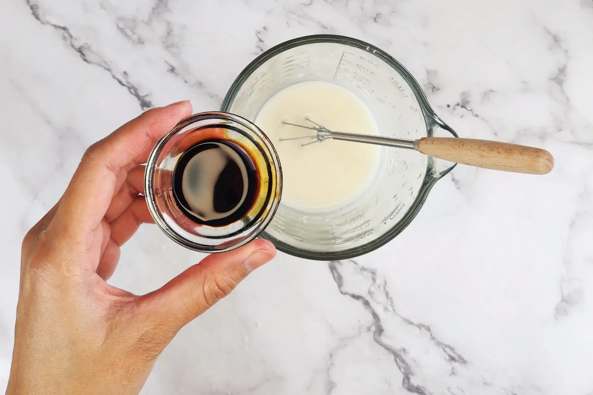 In a cup, combine water with arrowroot flour , palm sugar and black soy sauce