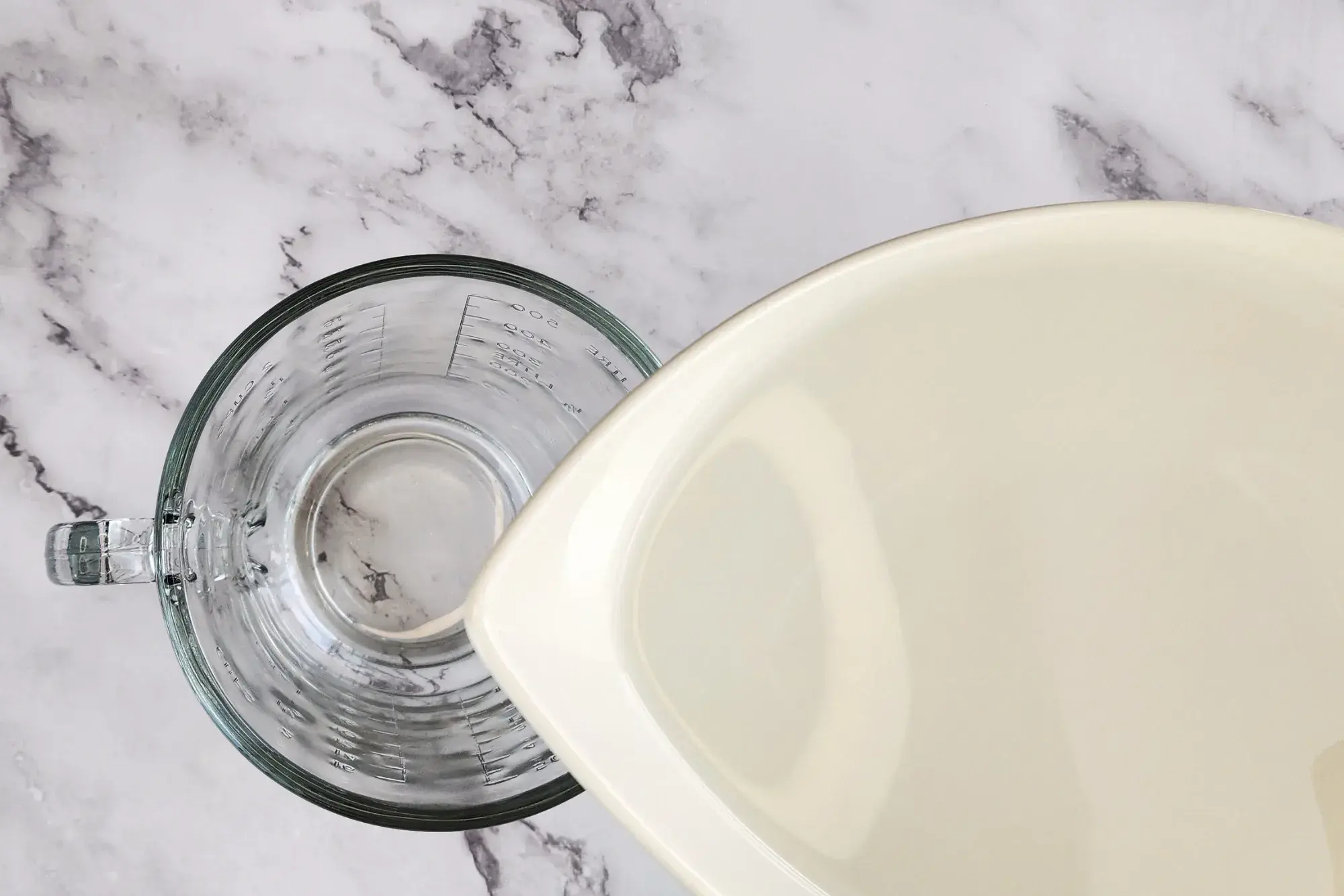 In a cup, combine water 