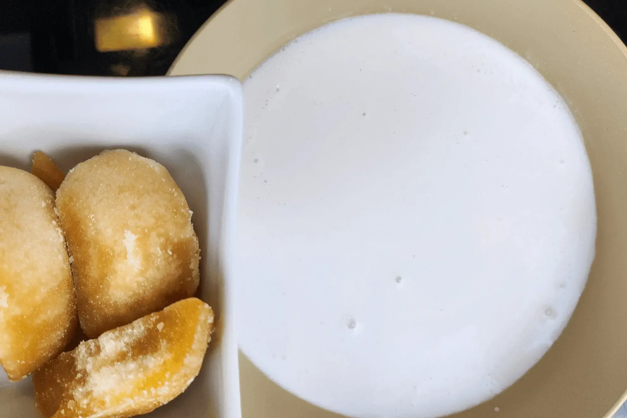 In a saucepan over medium heat, combine: coconut milk, palm sugar