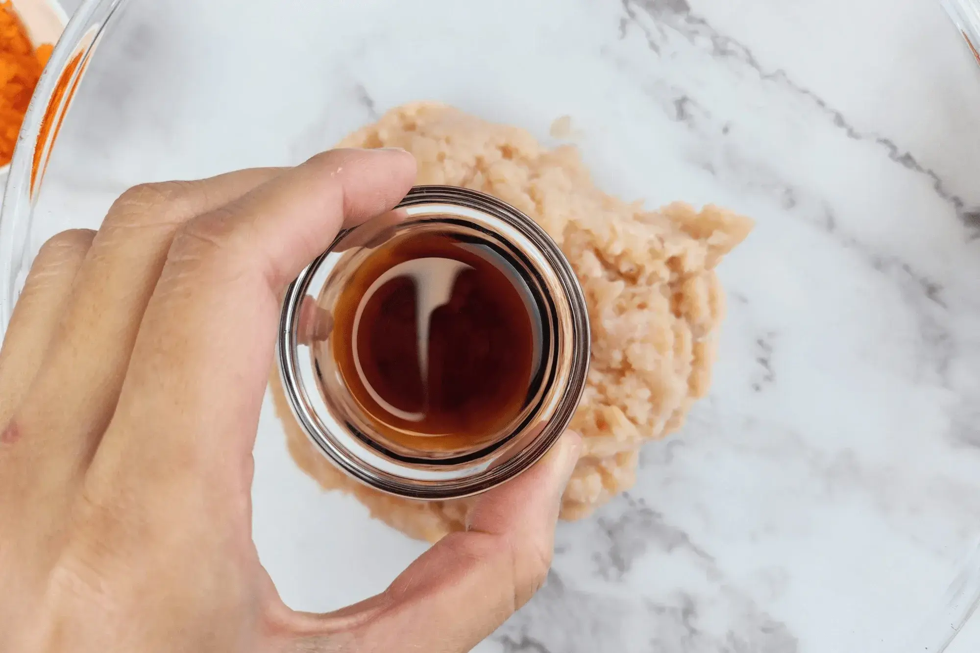 Mix ground chicken, minced garlic, black pepper-stuffed peppers, light soy sauce