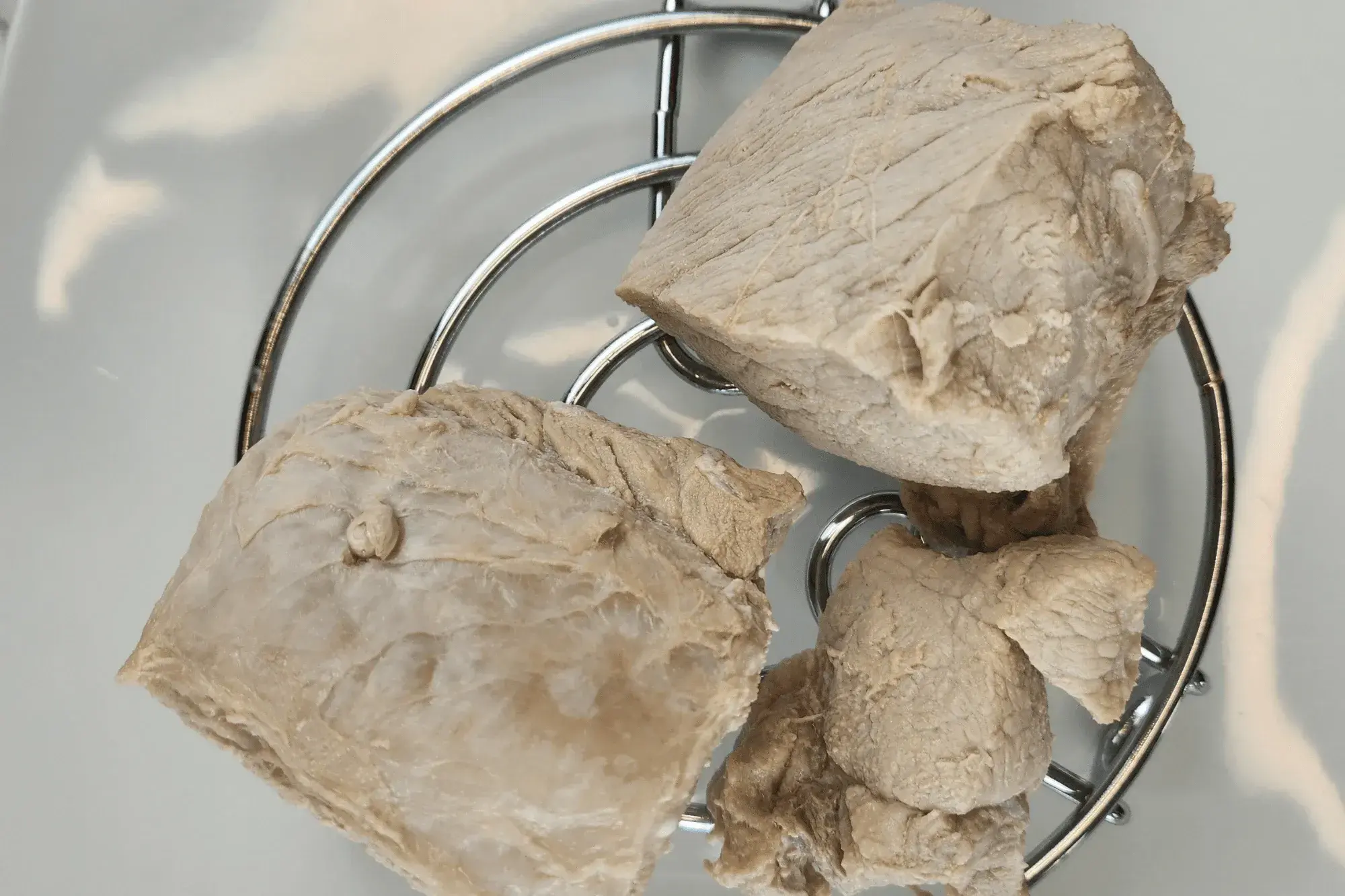 Once the pork is cool enough to handle