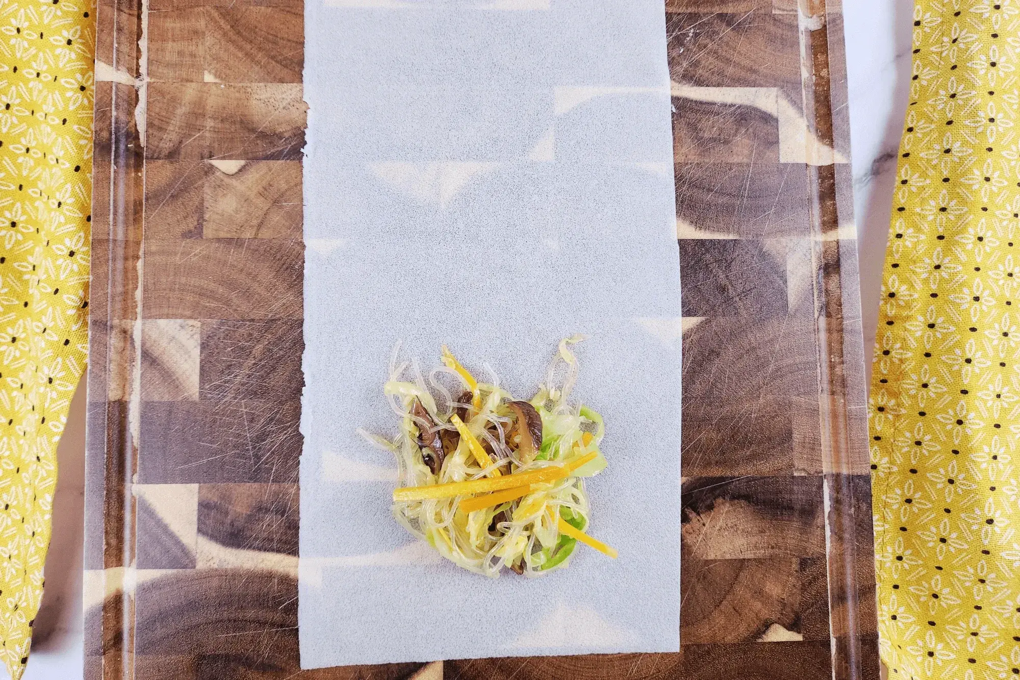 Place about 1 tablespoon of filling near the bottom.