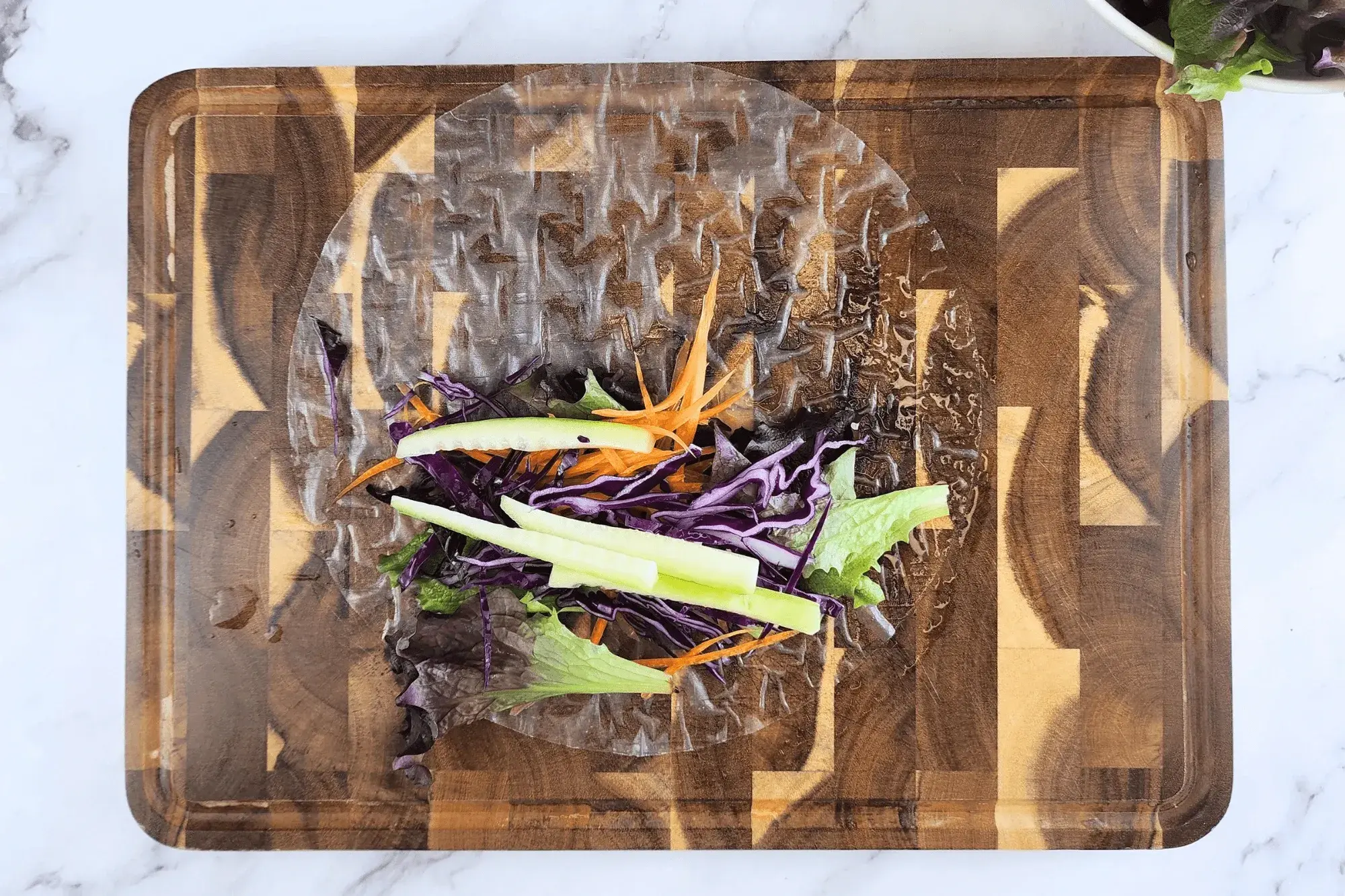 Place all veggies on the rice paper