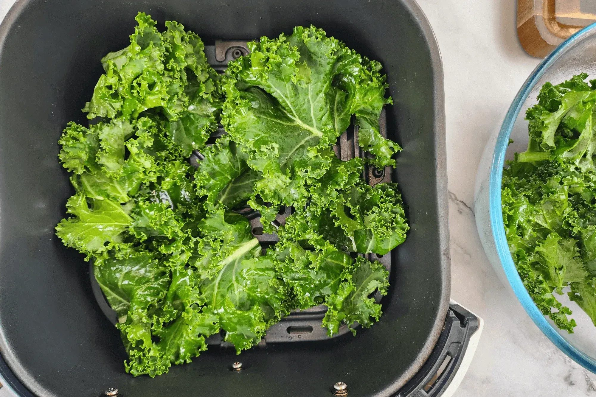 Place the kale in the air fryer basket