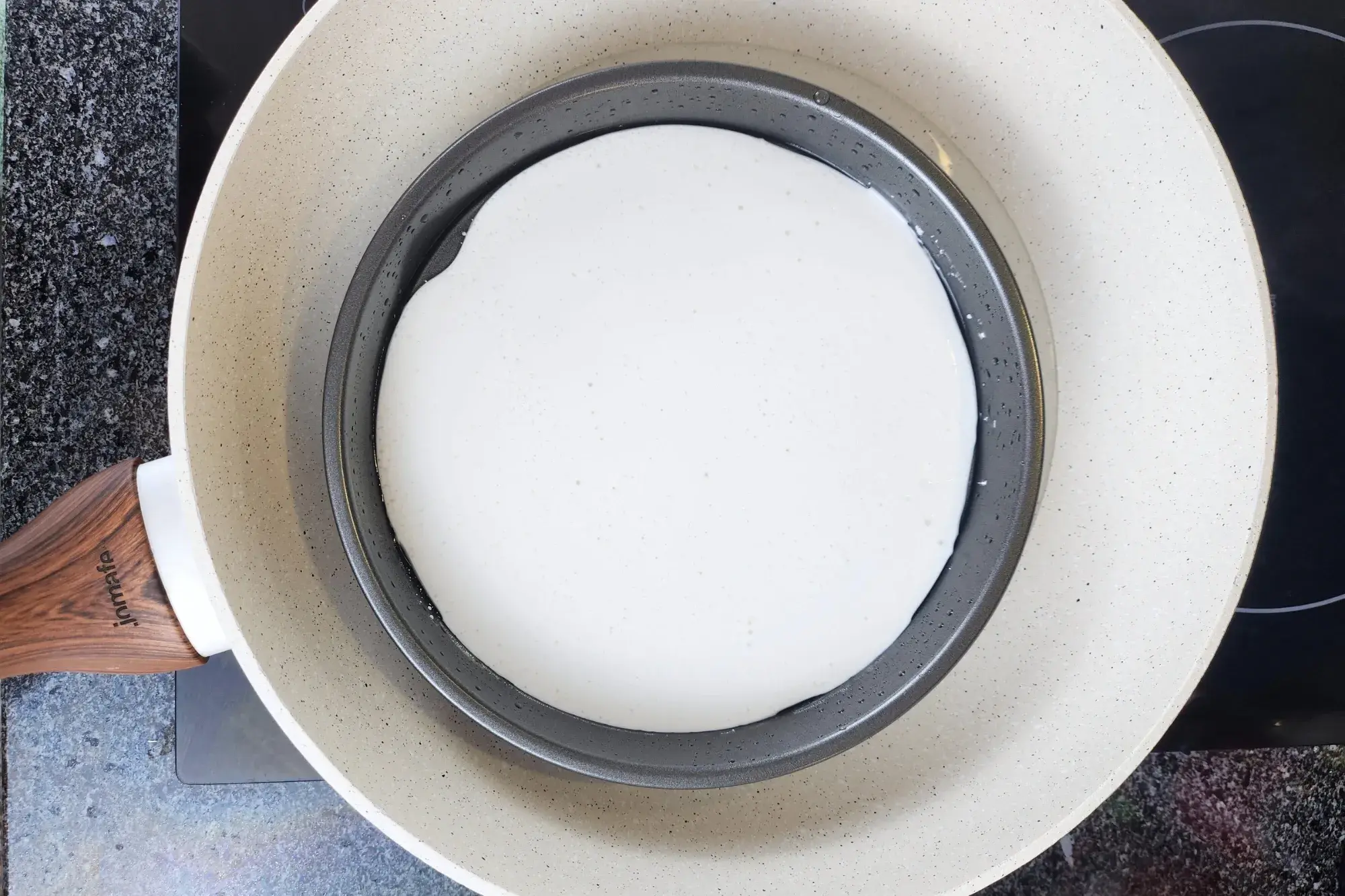  Pour a thin layer of batter onto your oiled tray