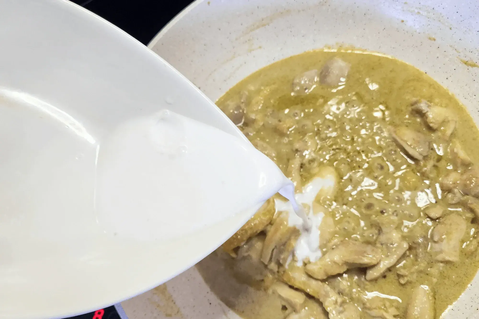 Pour in the remaining coconut milk 