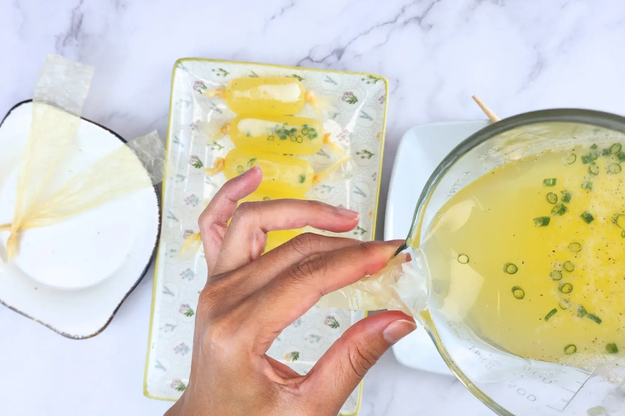 Pouring mixing egg white into sausage casing