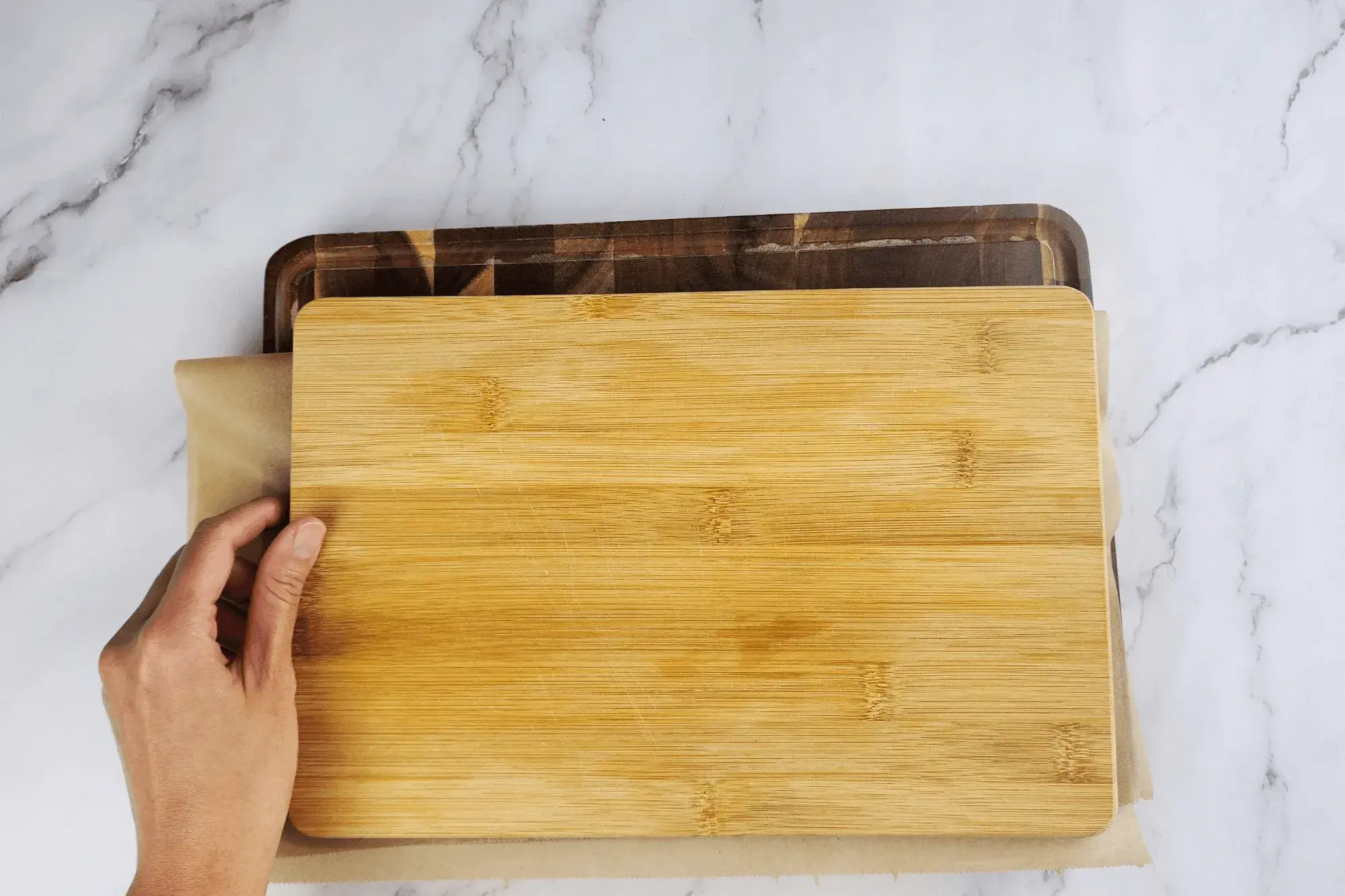Press the bananas flat. by chopping board