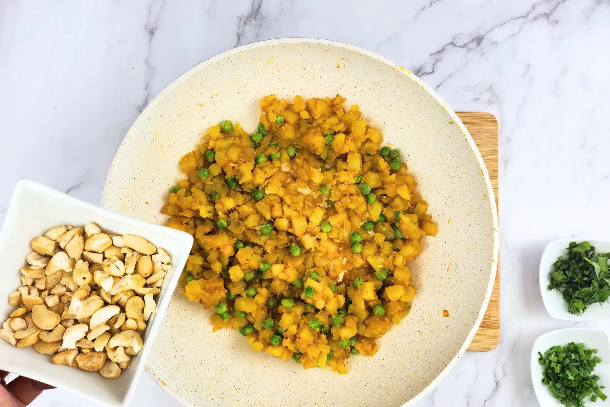 Remove from heat and mix in chopped cashews