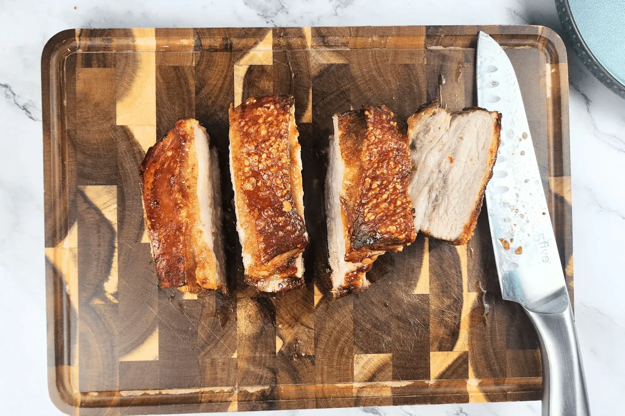 Remove the pork from the air fryer, cut off the twine