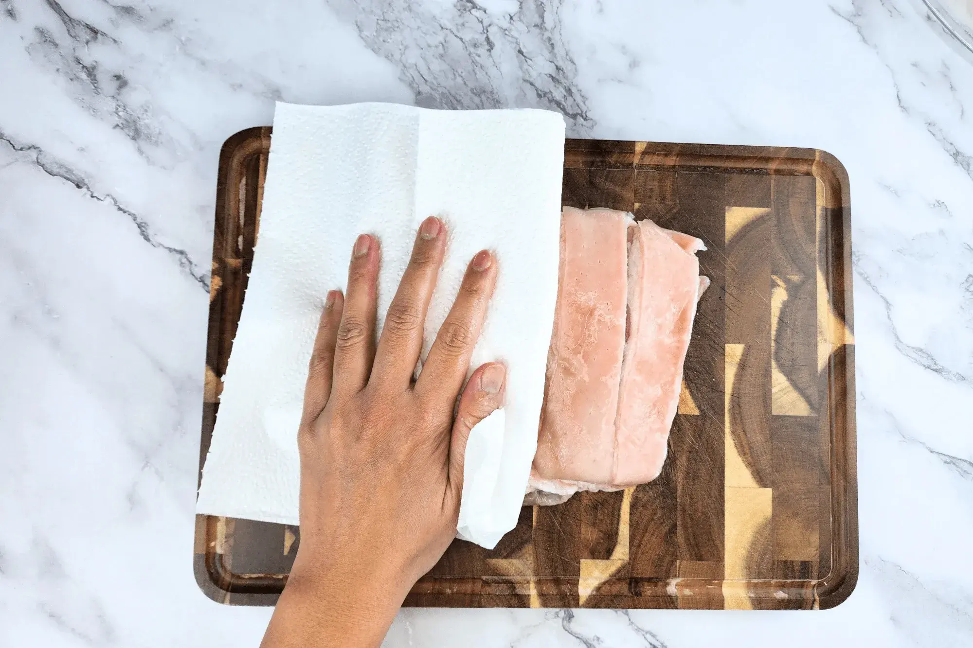 Remove the pork from the vinegar and pat dry.