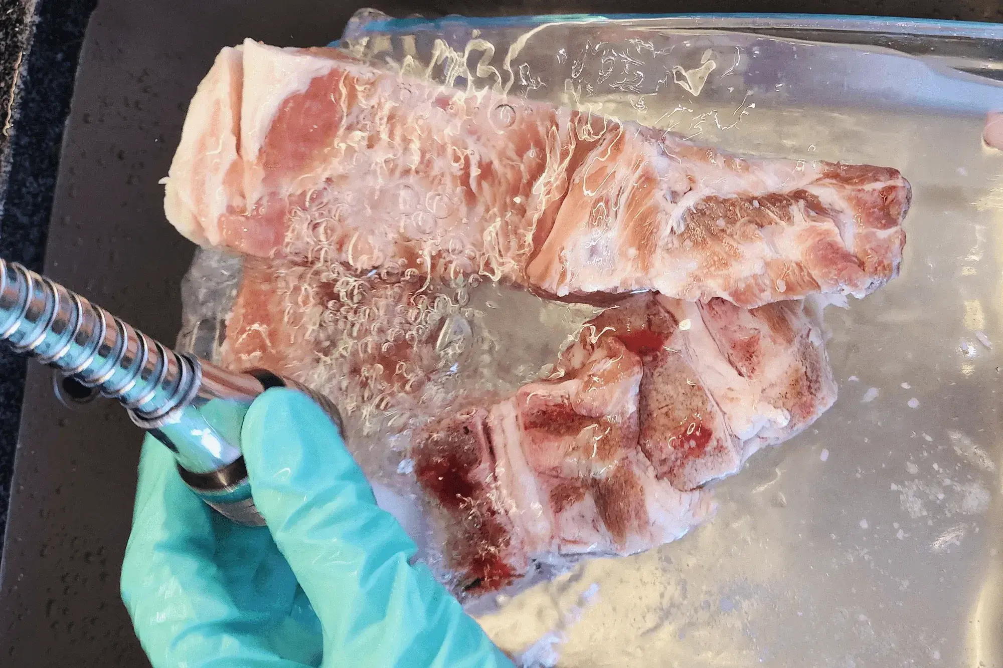 pork bones with running water