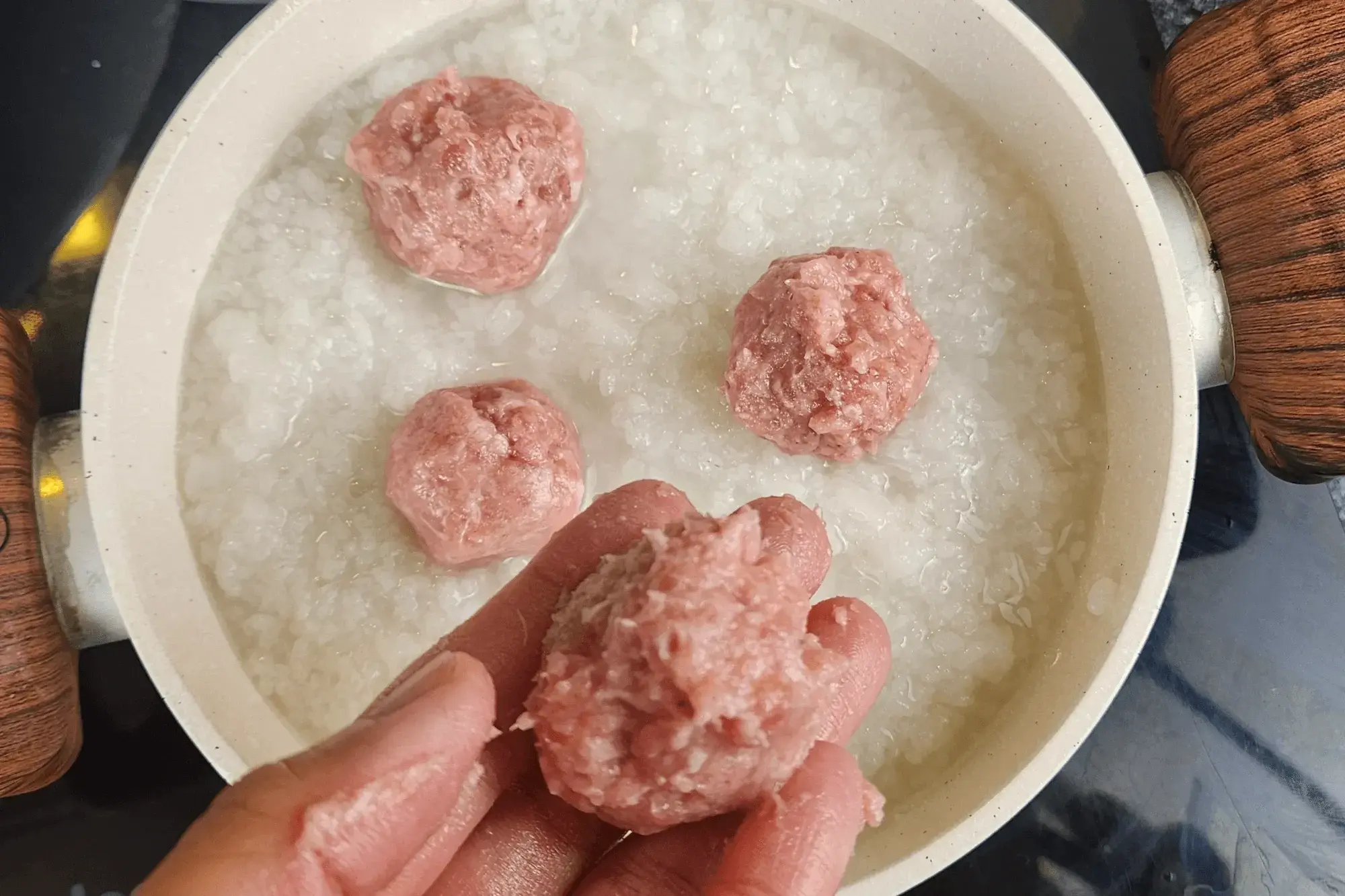 Shape the pork mixture into small meatballs.
