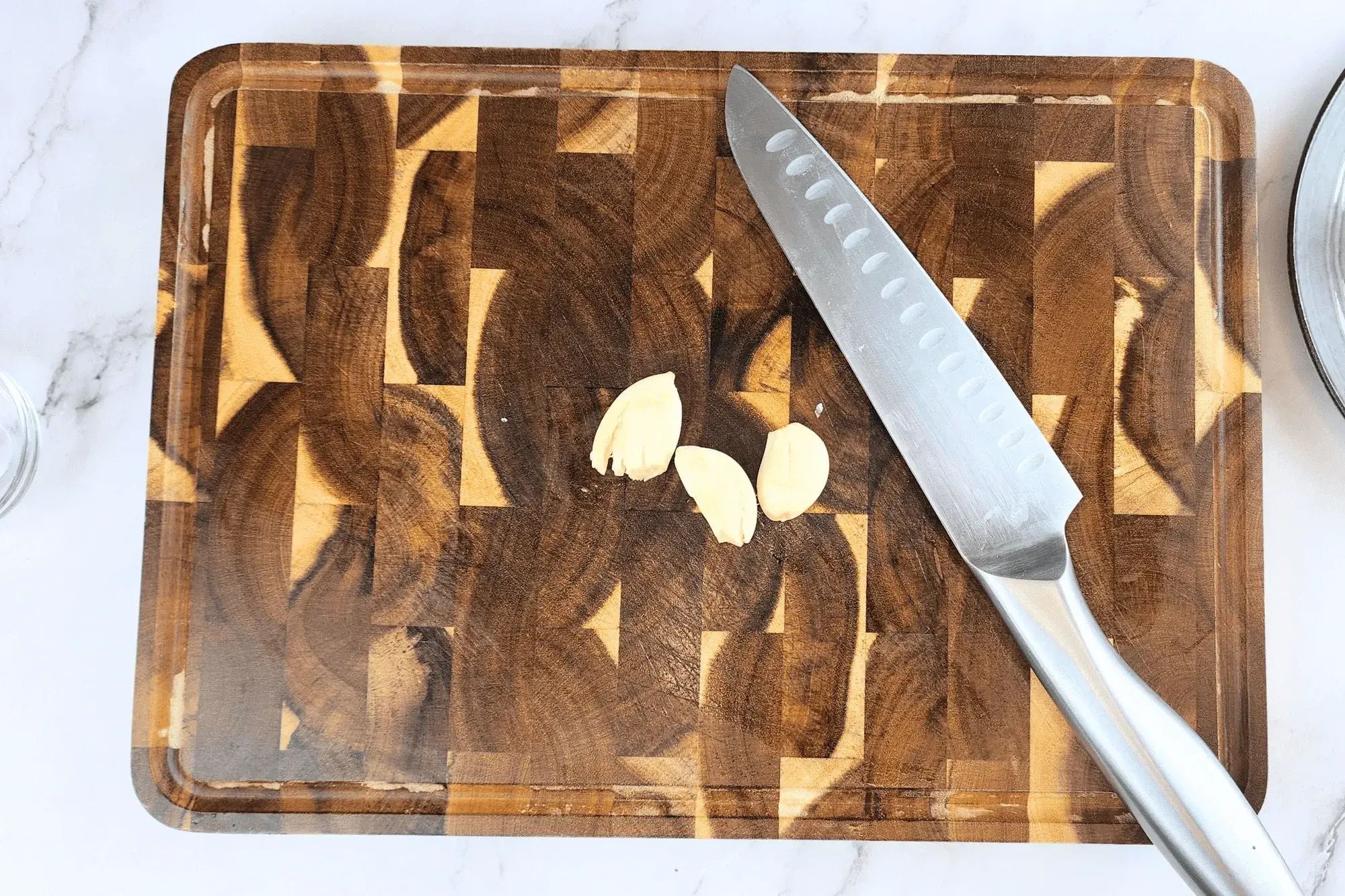 smashed garlic on the chopping board