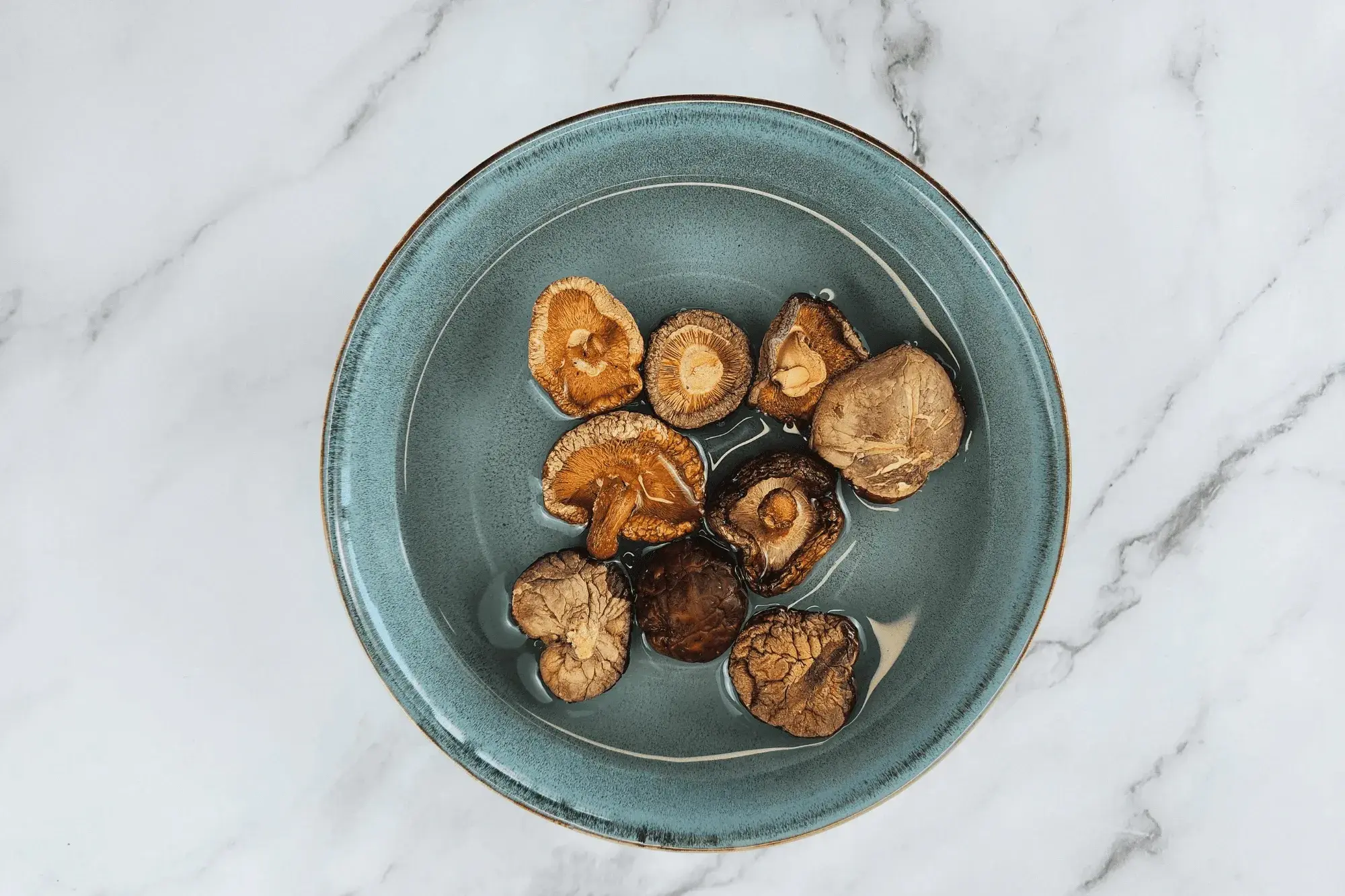 Soak the dried shiitake mushrooms until soft