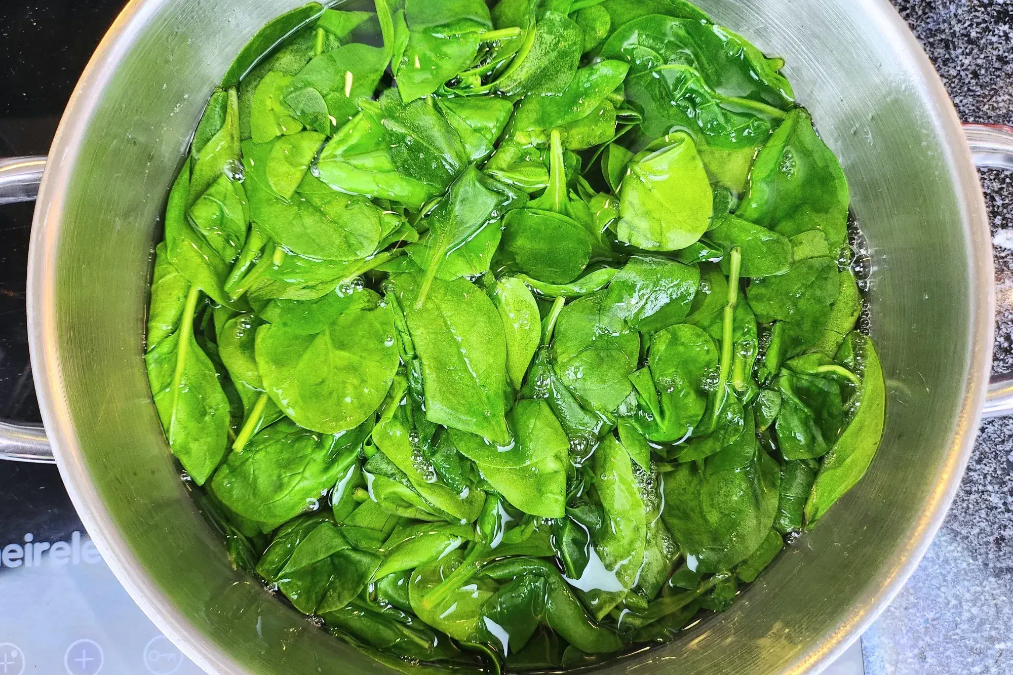 Spinach in hot water
