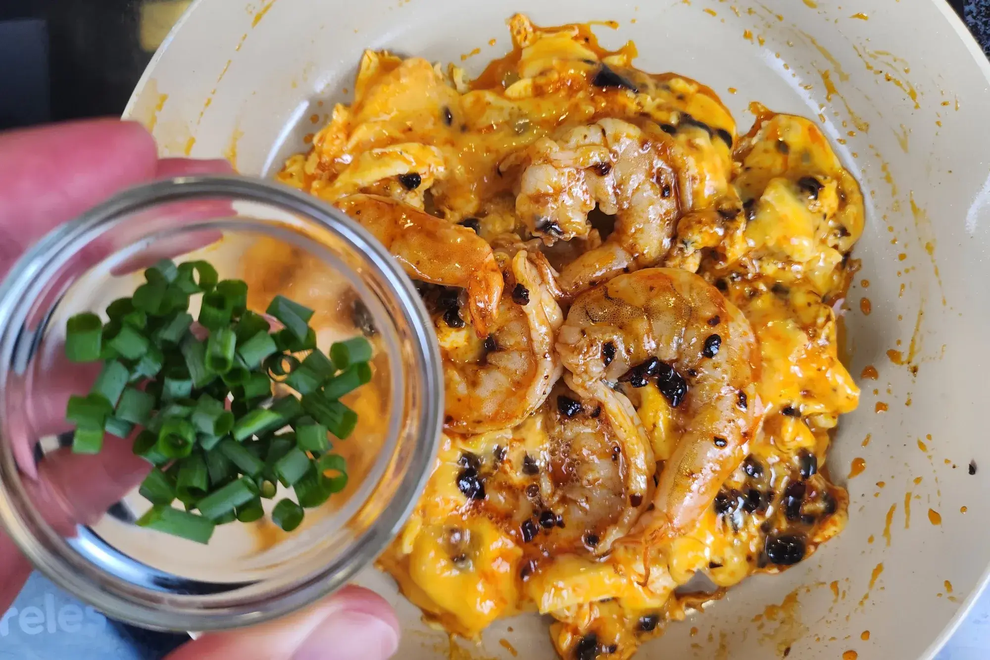 Sprinkle with spring onions 