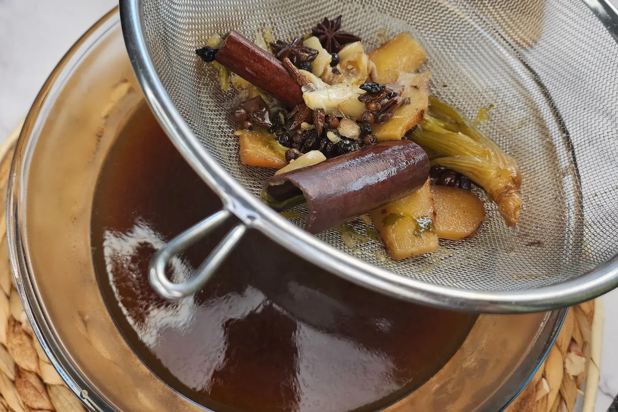 Strain out the herbs and spices.