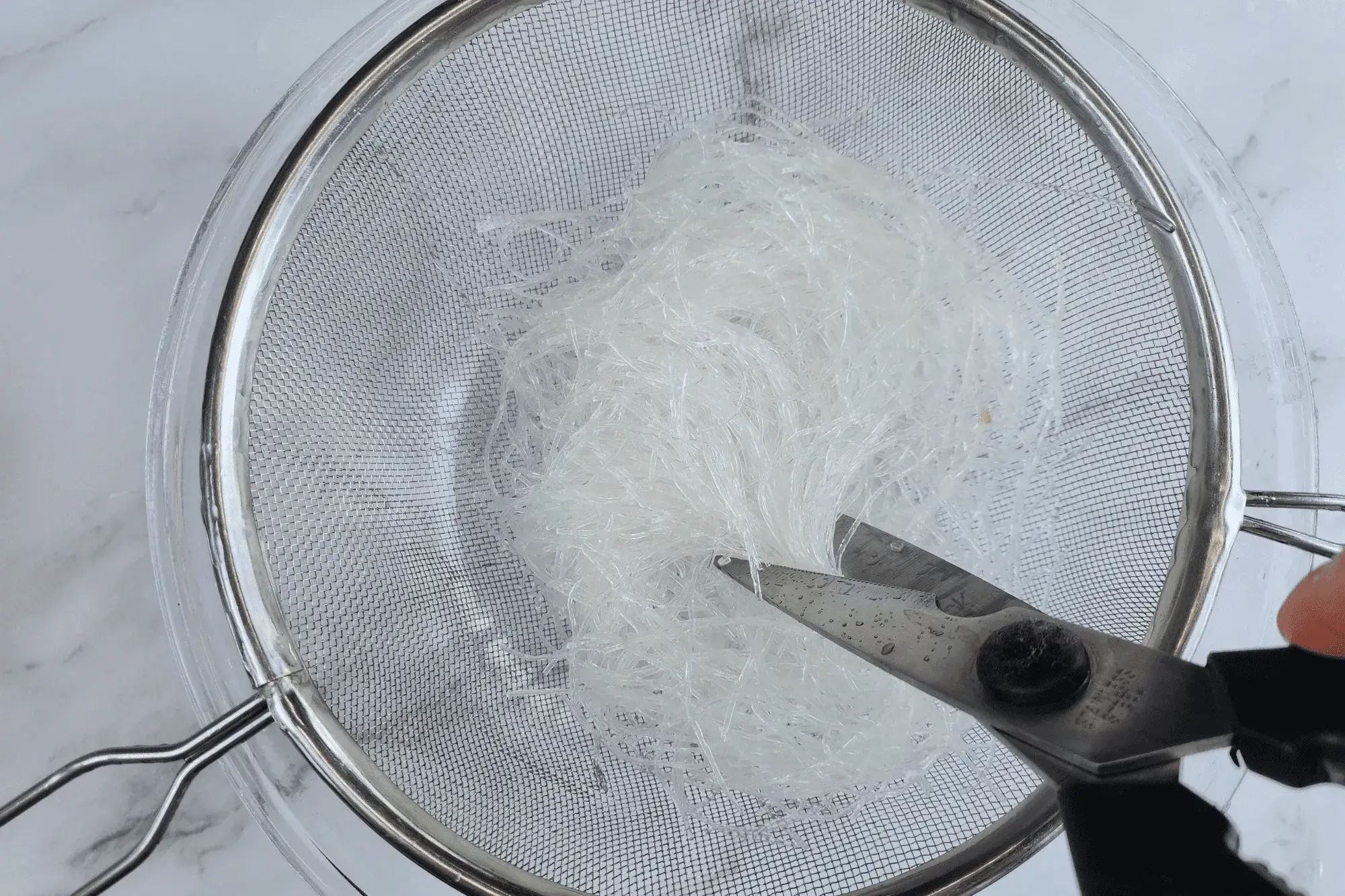 Then drain and cut them into shorter pieces.