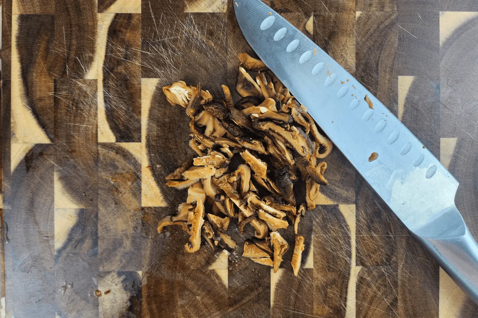 then squeeze out excess water and finely chop