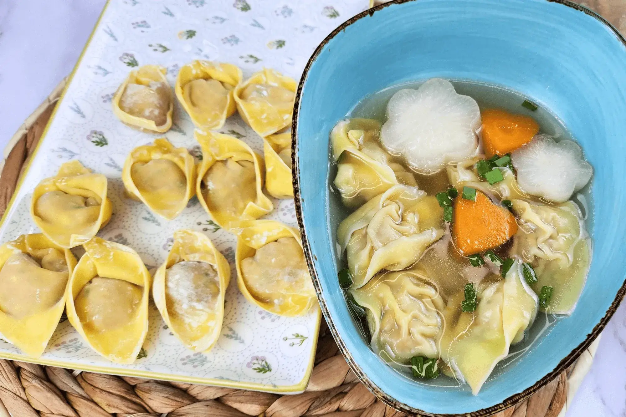 wonton soup in a bowl and uncooked wontons